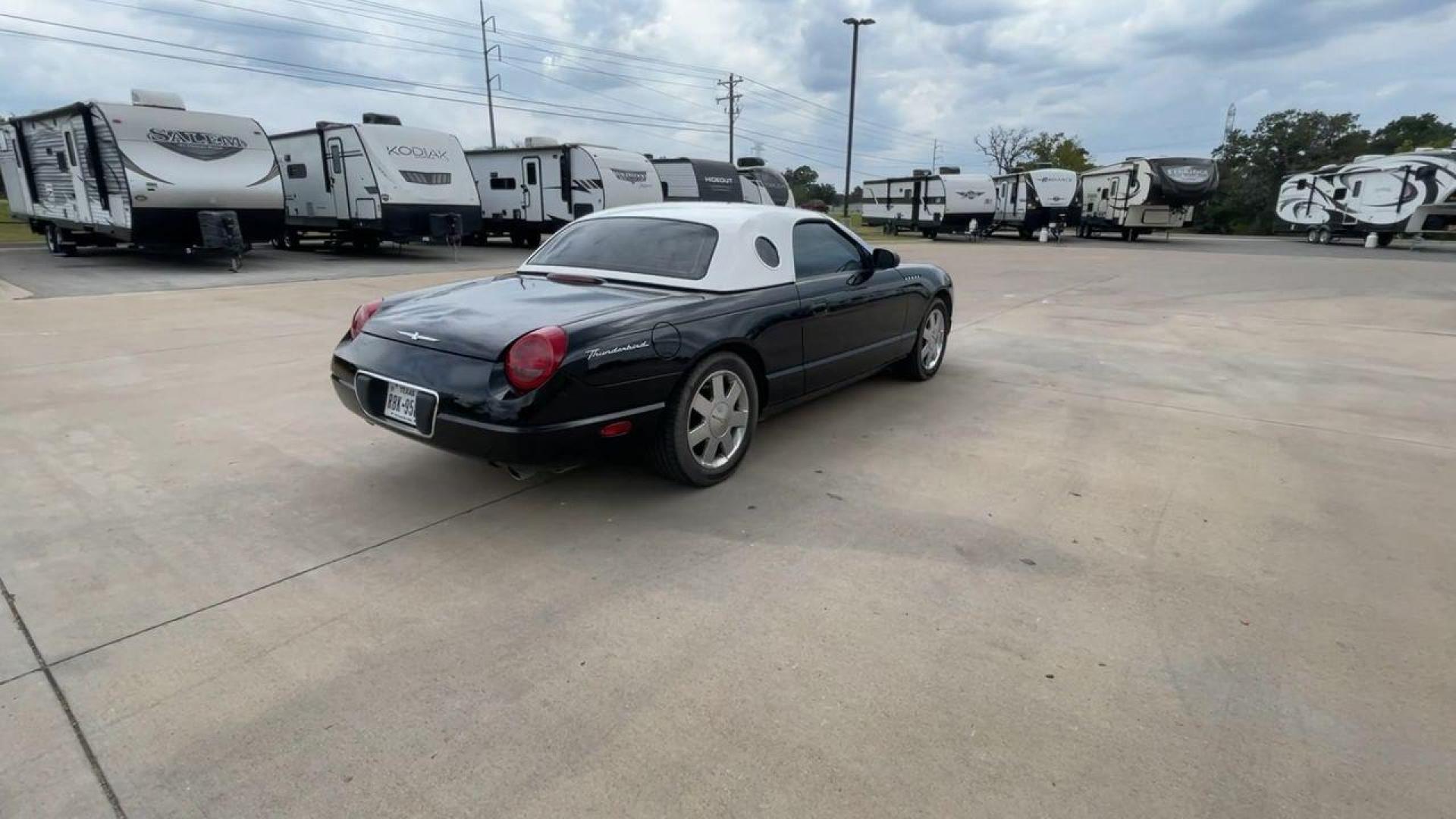 2002 BLACK FORD THUNDERBIRD (1FAHP60A82Y) , located at 4319 N Main Street, Cleburne, TX, 76033, (817) 221-0660, 32.435829, -97.384178 - Photo#1