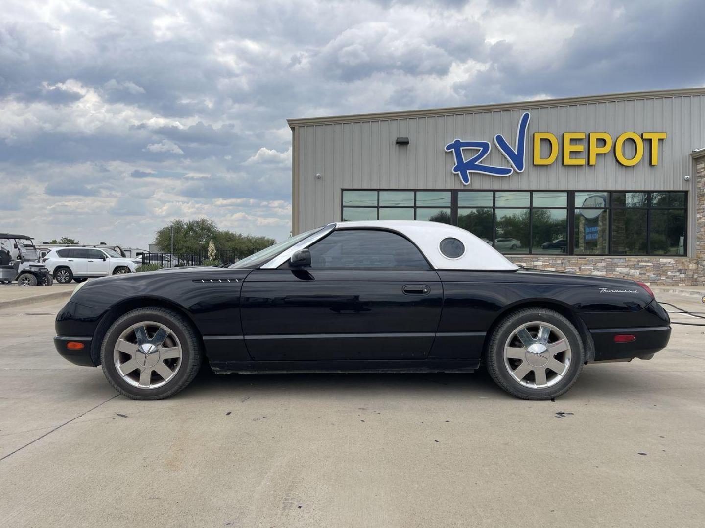 2002 BLACK FORD THUNDERBIRD (1FAHP60A82Y) , located at 4319 N Main Street, Cleburne, TX, 76033, (817) 221-0660, 32.435829, -97.384178 - Photo#23