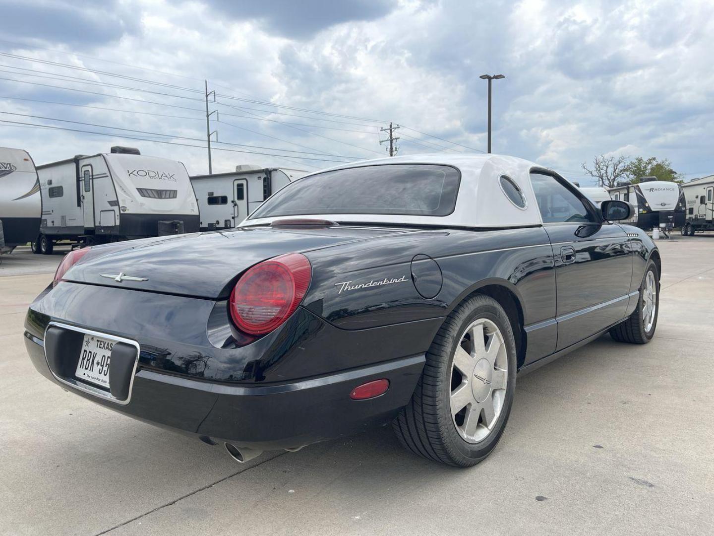 2002 BLACK FORD THUNDERBIRD (1FAHP60A82Y) , located at 4319 N Main Street, Cleburne, TX, 76033, (817) 221-0660, 32.435829, -97.384178 - Photo#24