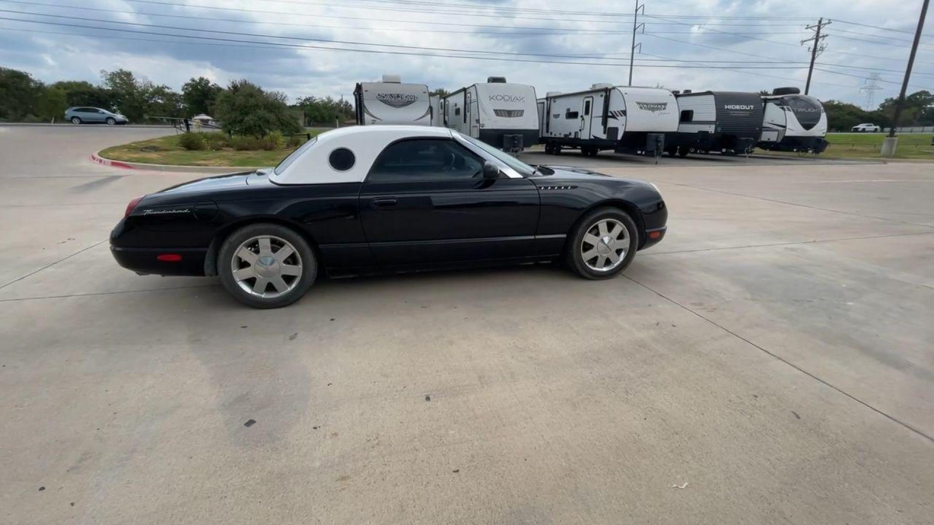 2002 BLACK FORD THUNDERBIRD (1FAHP60A82Y) , located at 4319 N Main Street, Cleburne, TX, 76033, (817) 221-0660, 32.435829, -97.384178 - Photo#2