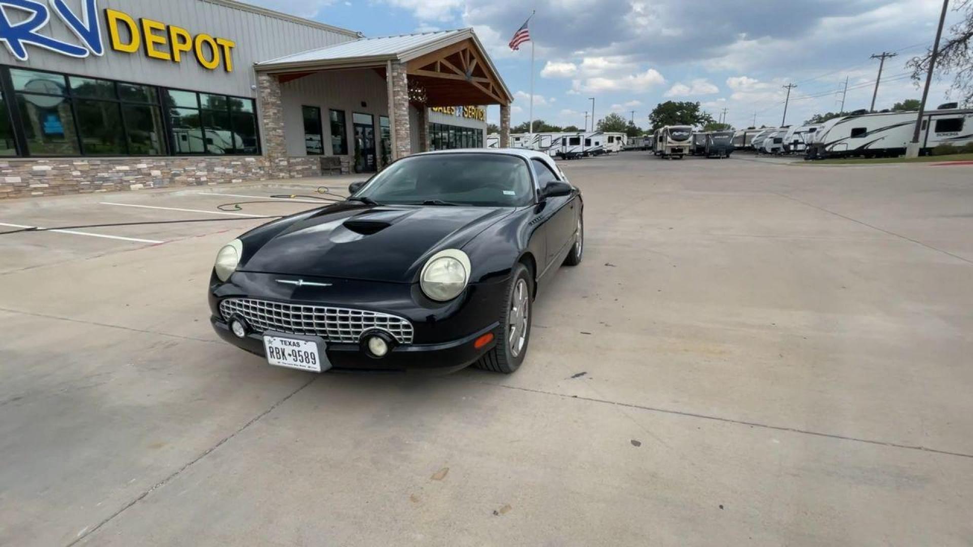 2002 BLACK FORD THUNDERBIRD (1FAHP60A82Y) , located at 4319 N Main Street, Cleburne, TX, 76033, (817) 221-0660, 32.435829, -97.384178 - Photo#5