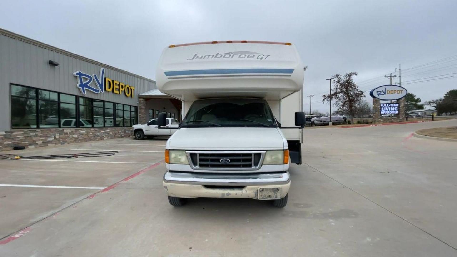 2003 WHITE FLEETWOOD JAMBOREE GT E450 (1FDXE45S93H) with an 6.8L V10 SOHC 20V engine, located at 4319 N Main Street, Cleburne, TX, 76033, (817) 221-0660, 32.435829, -97.384178 - The 2003 Fleetwood Jamboree GT allows you to enjoy the beauty of nature. Experience the ultimate in RV luxury with rear roof access, providing unparalleled views from the comfort of your mobile abode. With a spacious awning and a slide-out feature, you'll have plenty of room to enjoy the outdoors an - Photo#4