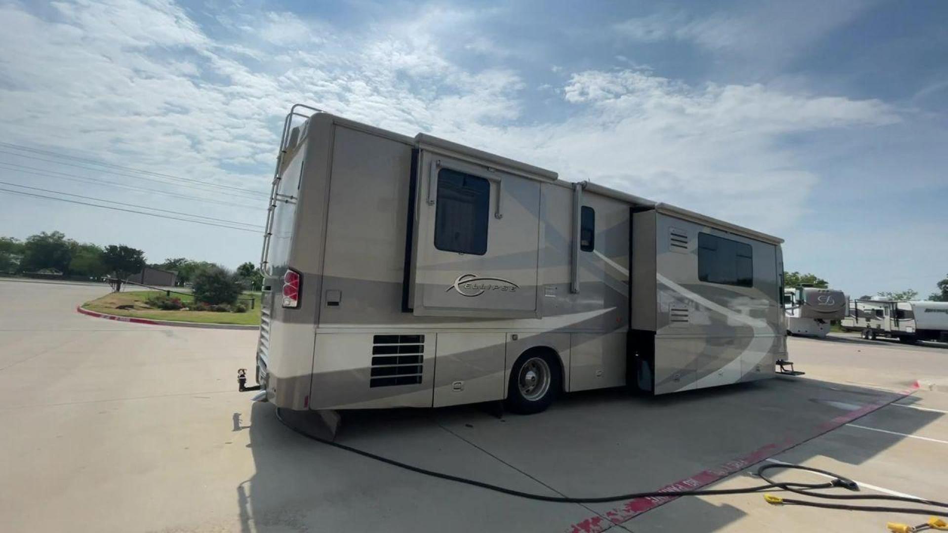 2006 BLUE ITASCA ELLIPSE 40FD - (4UZACKDC56C) , Length: 39 ft | Dry Weight: 32000 lbs | Gross Weight: 42000 lbs transmission, located at 4319 N Main Street, Cleburne, TX, 76033, (817) 221-0660, 32.435829, -97.384178 - Here is the 2006 Itasca Ellipse 40FD, a top-of-the-line Class A motorhome designed for road trippers who want the ultimate in comfort and style. It is 39 feet long and weighs 32,000 pounds dry. The inside is very roomy and comfortable, making it perfect for long trips. The gross weight of this RV is - Photo#1