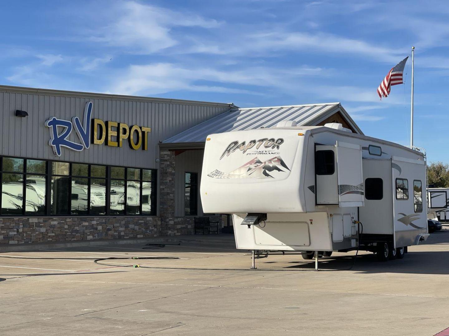 2006 KEYSTONE RAPTOR (4YDF361376M) , Length: 37.58 ft | Dry Weight: 11,615 lbs | Slides: 2 transmission, located at 4319 N Main Street, Cleburne, TX, 76033, (817) 221-0660, 32.435829, -97.384178 - The 2016 Keystone Raptor RP3612 is a fifth-wheel toy hauler with a bold and functional exterior. It features a white body with stylish decals that include swooping lines and mountain graphics, giving it a sporty and adventurous look. The RV has three axles, offering stability and support for its lar - Photo#0