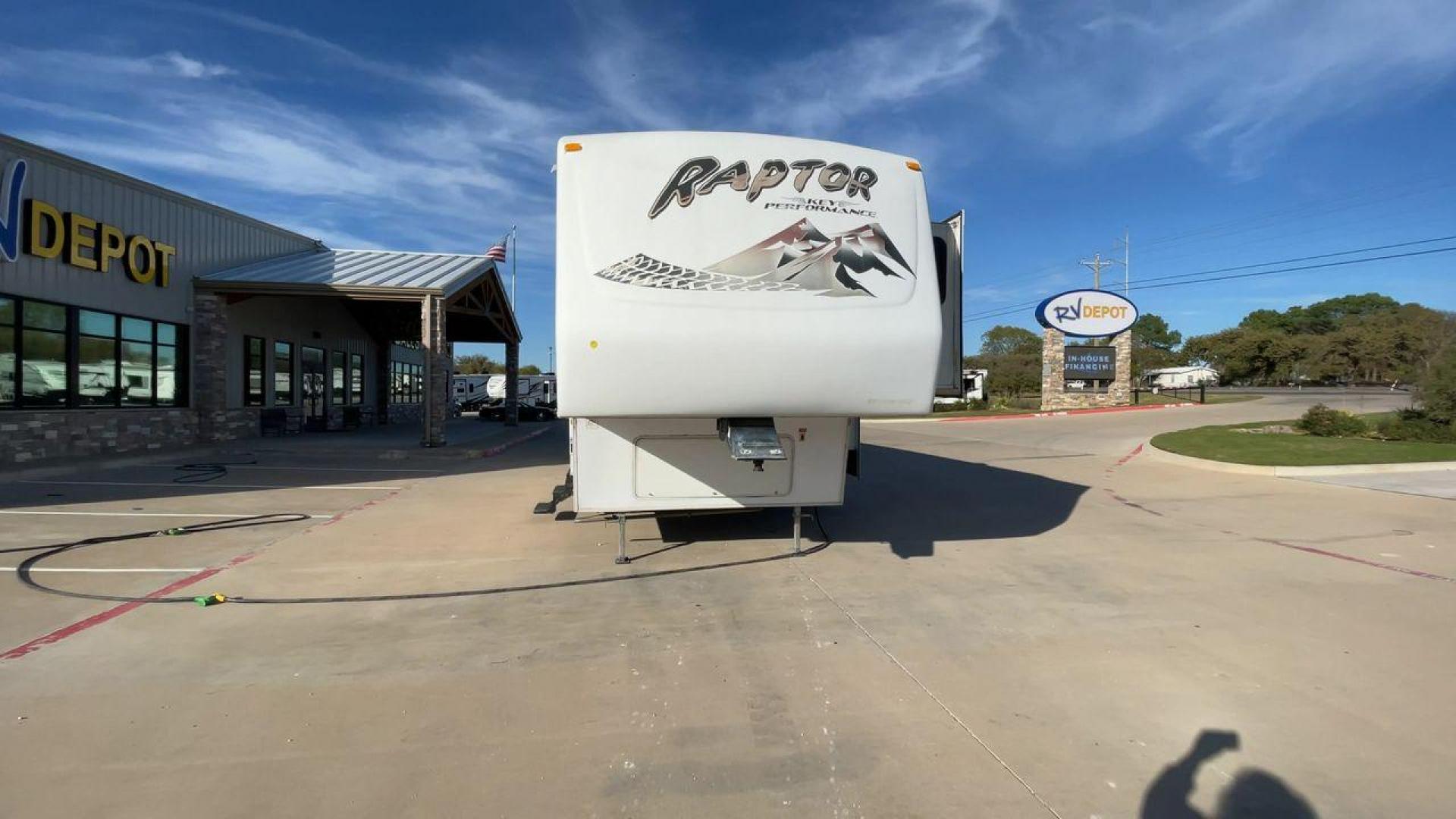 2006 KEYSTONE RAPTOR (4YDF361376M) , Length: 37.58 ft | Dry Weight: 11,615 lbs | Slides: 2 transmission, located at 4319 N Main Street, Cleburne, TX, 76033, (817) 221-0660, 32.435829, -97.384178 - The 2016 Keystone Raptor RP3612 is a fifth-wheel toy hauler with a bold and functional exterior. It features a white body with stylish decals that include swooping lines and mountain graphics, giving it a sporty and adventurous look. The RV has three axles, offering stability and support for its lar - Photo#4