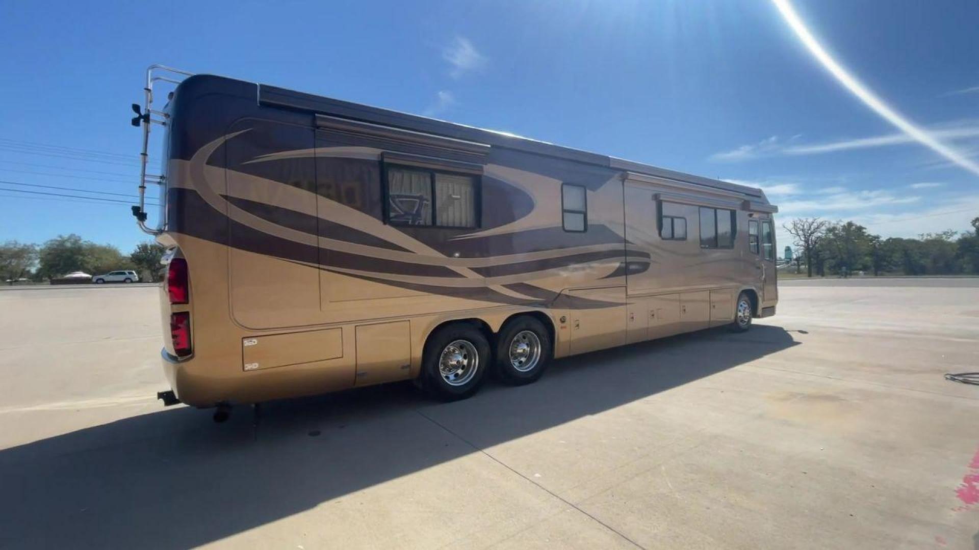 2006 TAN DES MONACO SIGNATURE COMMANDER (1RF17561561) , located at 4319 N Main Street, Cleburne, TX, 76033, (817) 221-0660, 32.435829, -97.384178 - The 2006 Monaco Signature 45 is the ultimate in luxury and speed. It is a diesel pusher motorhome that oozes class and precision engineering. This 45-foot wonder shows how dedicated Monaco is to quality work and new ideas. The Signature 45 has a strong diesel engine and is well-built, so it has a sm - Photo#1