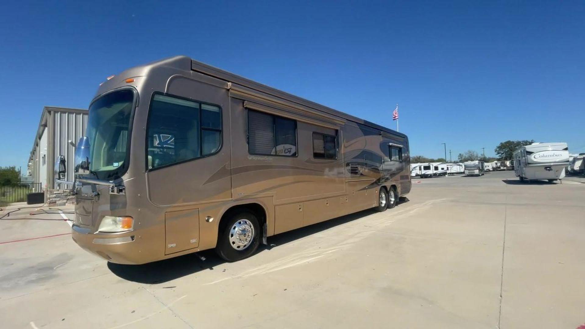 2006 TAN DES MONACO SIGNATURE COMMANDER (1RF17561561) , located at 4319 N Main Street, Cleburne, TX, 76033, (817) 221-0660, 32.435829, -97.384178 - The 2006 Monaco Signature 45 is the ultimate in luxury and speed. It is a diesel pusher motorhome that oozes class and precision engineering. This 45-foot wonder shows how dedicated Monaco is to quality work and new ideas. The Signature 45 has a strong diesel engine and is well-built, so it has a sm - Photo#5