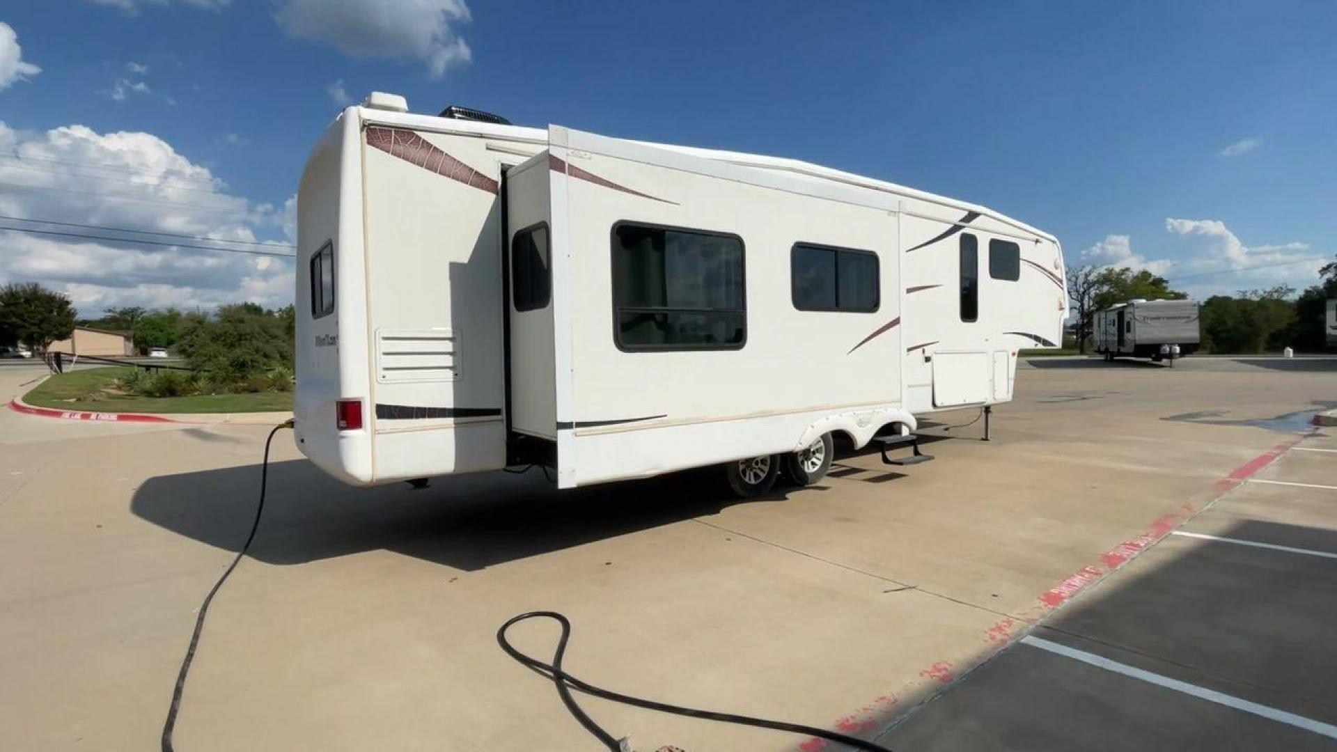 2007 WHITE MONTANA 3585SA (4YDF3582274) , Length: 38.33 ft. | Dry Weight: 11,555 lbs. | Slides: 3 transmission, located at 4319 N Main Street, Cleburne, TX, 76033, (817) 221-0660, 32.435829, -97.384178 - The 2007 Montana 3585SA fifth wheel provides every family with the best overall features so that you can rest and enjoy an excellent camping experience. This fifth wheel measures 38.33 ft in length, 8 ft in width, and 12.75 ft in height. It has a dry weight of 11,555 lbs., a payload capacity of 4,02 - Photo#1