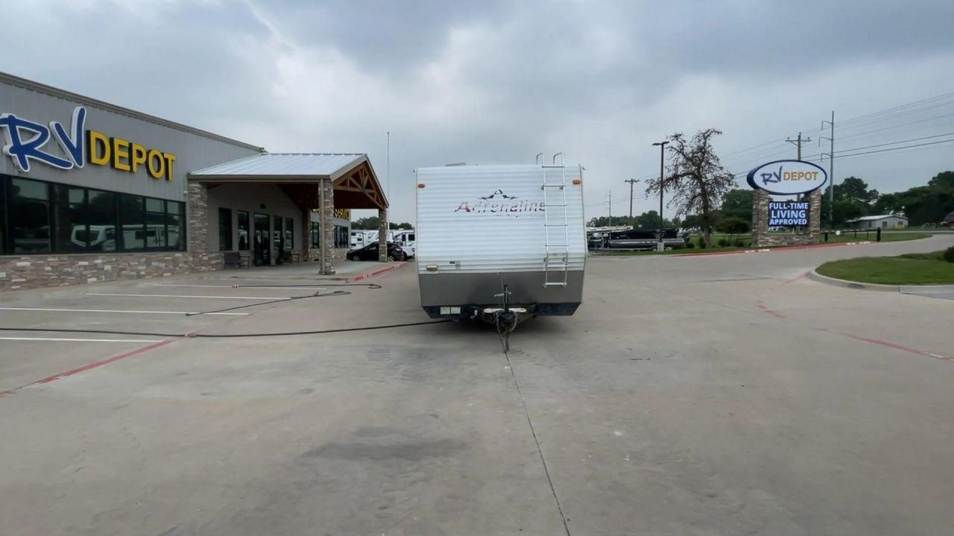 2008 WHITE ADRENALINE 23FS (1TC2B180683) , Length: 28.67 ft | Dry Weight: 6,474 lbs | Gross Weight: 9,500 lbs | Slides: 9 transmission, located at 4319 N Main Street, Cleburne, TX, 76033, (817) 221-0660, 32.435829, -97.384178 - The 2008 Adrenaline 23FS Toy Hauler is prepared for a journey! It is 28.67 feet long and weighs 6,474 pounds when dry. It's lightweight and portable, but large enough to hold all of your favorite toys and accessories. It can accommodate up to 9,500 pounds, so you'll have plenty of room for your next - Photo#4