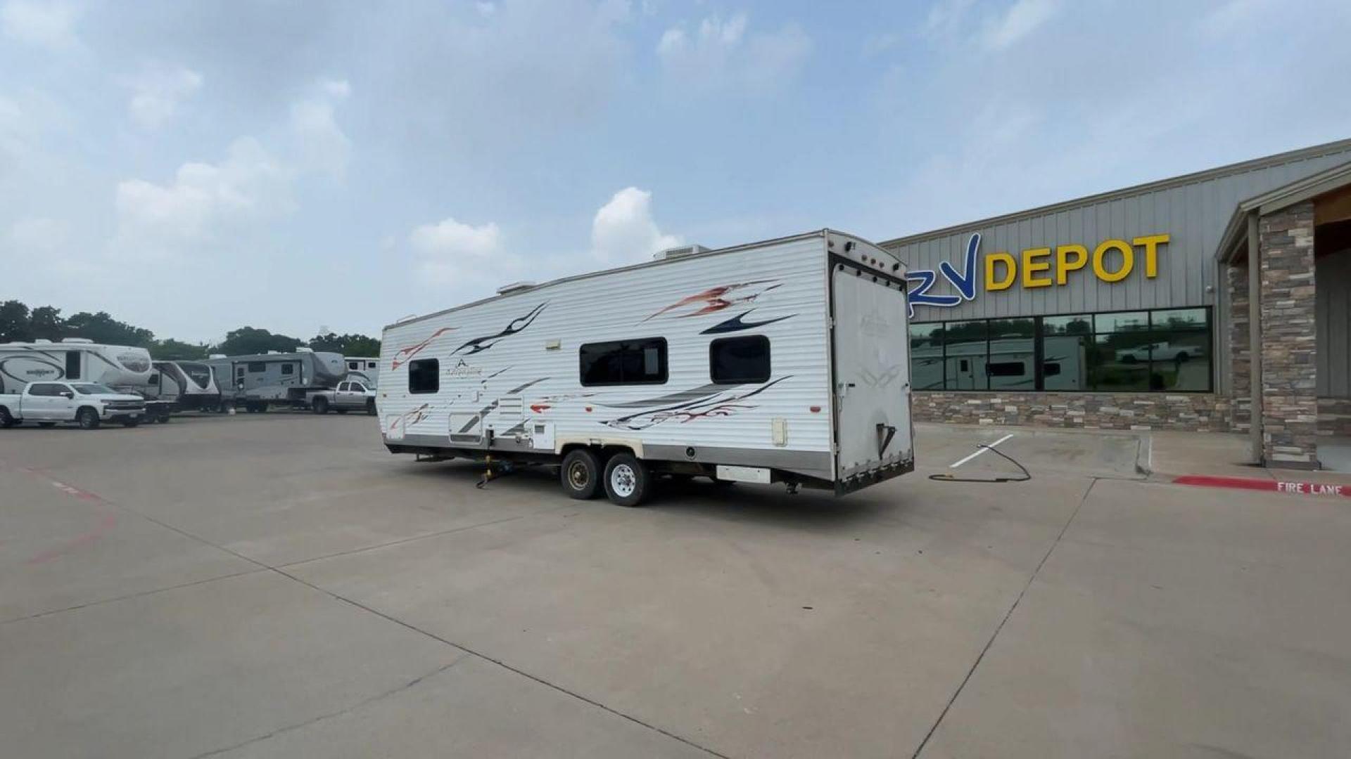 2008 WHITE ADRENALINE 23FS (1TC2B180683) , Length: 28.67 ft | Dry Weight: 6,474 lbs | Gross Weight: 9,500 lbs | Slides: 9 transmission, located at 4319 N Main Street, Cleburne, TX, 76033, (817) 221-0660, 32.435829, -97.384178 - The 2008 Adrenaline 23FS Toy Hauler is prepared for a journey! It is 28.67 feet long and weighs 6,474 pounds when dry. It's lightweight and portable, but large enough to hold all of your favorite toys and accessories. It can accommodate up to 9,500 pounds, so you'll have plenty of room for your next - Photo#7