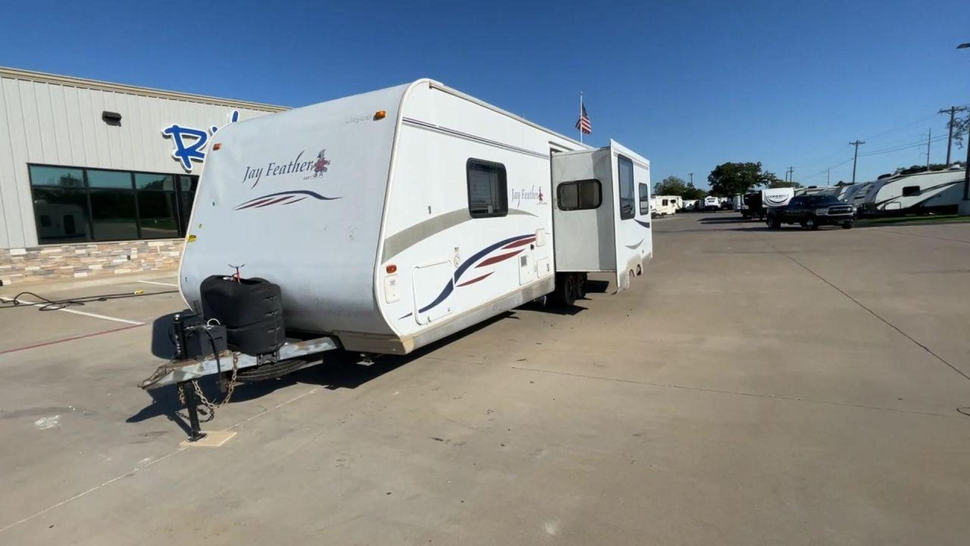 2008 WHITE JAY FEATHER 29D (1UJBJ02P381) , Length: 31.1 ft. | Dry Weight: 5,810 lbs. | Gross Weight: 7,350 lbs. | Slides: 1 transmission, located at 4319 N Main Street, Cleburne, TX, 76033, (817) 221-0660, 32.435829, -97.384178 - Explore more reasons that emphasize the benefits of having this RV as your own. (1) It is lightweight and durable, thanks to its Aluminum Frame and Fiberglass body panels that are resistant to rust and corrosion. (2) It offers a smooth, attractive finish and additional weather resistance with it - Photo#0