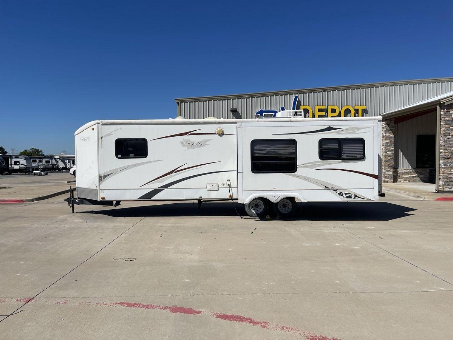 2008 WHITE VR-1 299RLS (4YDT299268V) , Length: 33 ft. | Dry Weight: 6,810 lbs. | Slides: 1 transmission, located at 4319 N Main Street, Cleburne, TX, 76033, (817) 221-0660, 32.435829, -97.384178 - The 2008 VR-1 299RLS is a dual-axle steel wheel setup measuring 33 ft. long and 11.17 ft. tall. It has a dry weight of 6,810 lbs. and a payload capacity of 2,805 lbs. It also has a hitch weight of 815 lbs. It includes one slide and one power awning. This travel trailer features a rear living floorpl - Photo#23