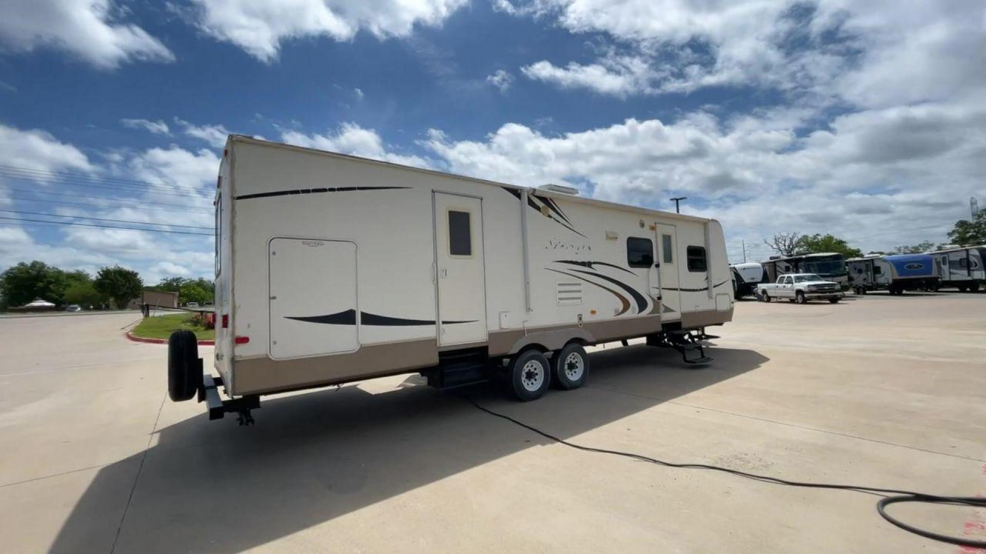 2009 KEYSTONE SPRINTER 311BHS (4YDT3112291) , Length: 35.33 ft | Dry Weight: 8,140 lbs. | Gross Weight: 11,185 lbs | Slides: 2 transmission, located at 4319 N Main Street, Cleburne, TX, 76033, (817) 221-0660, 32.435829, -97.384178 - Indulge in the ultimate in cozy and memorable camping with the 2009 Keystone Sprinter 311BHS. This 35-foot travel trailer perfectly blends functionality and style to offer a comfortable and practical haven for families and friends. With a dry weight of 8,140 lbs., the Sprinter 311BHS is a lightweigh - Photo#1