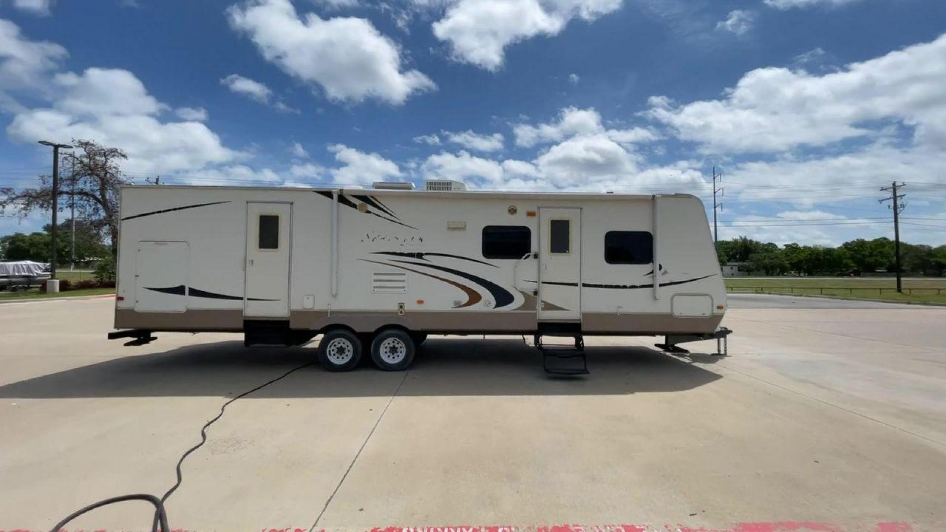 2009 KEYSTONE SPRINTER 311BHS (4YDT3112291) , Length: 35.33 ft | Dry Weight: 8,140 lbs. | Gross Weight: 11,185 lbs | Slides: 2 transmission, located at 4319 N Main Street, Cleburne, TX, 76033, (817) 221-0660, 32.435829, -97.384178 - Indulge in the ultimate in cozy and memorable camping with the 2009 Keystone Sprinter 311BHS. This 35-foot travel trailer perfectly blends functionality and style to offer a comfortable and practical haven for families and friends. With a dry weight of 8,140 lbs., the Sprinter 311BHS is a lightweigh - Photo#2