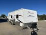 2010 WHITE CROSSROADS ZINGER (4V0TC252XAA) , Length: 26 ft | Dry Weight: 4,519 lbs | Gross Weight: 7,580 lbs | Slides: 1 transmission, located at 4319 N Main Street, Cleburne, TX, 76033, (817) 221-0660, 32.435829, -97.384178 - With the 2010 CrossRoads RV Zinger ZT250RK, you may have the perfect balance of comfort and convenience. The dry weight of this 26-foot travel trailer is 4,519 pounds, while the gross weight is 7,580. This makes it easy to tow without sacrificing space or comfort. This RV has a single slide-out and - Photo#22