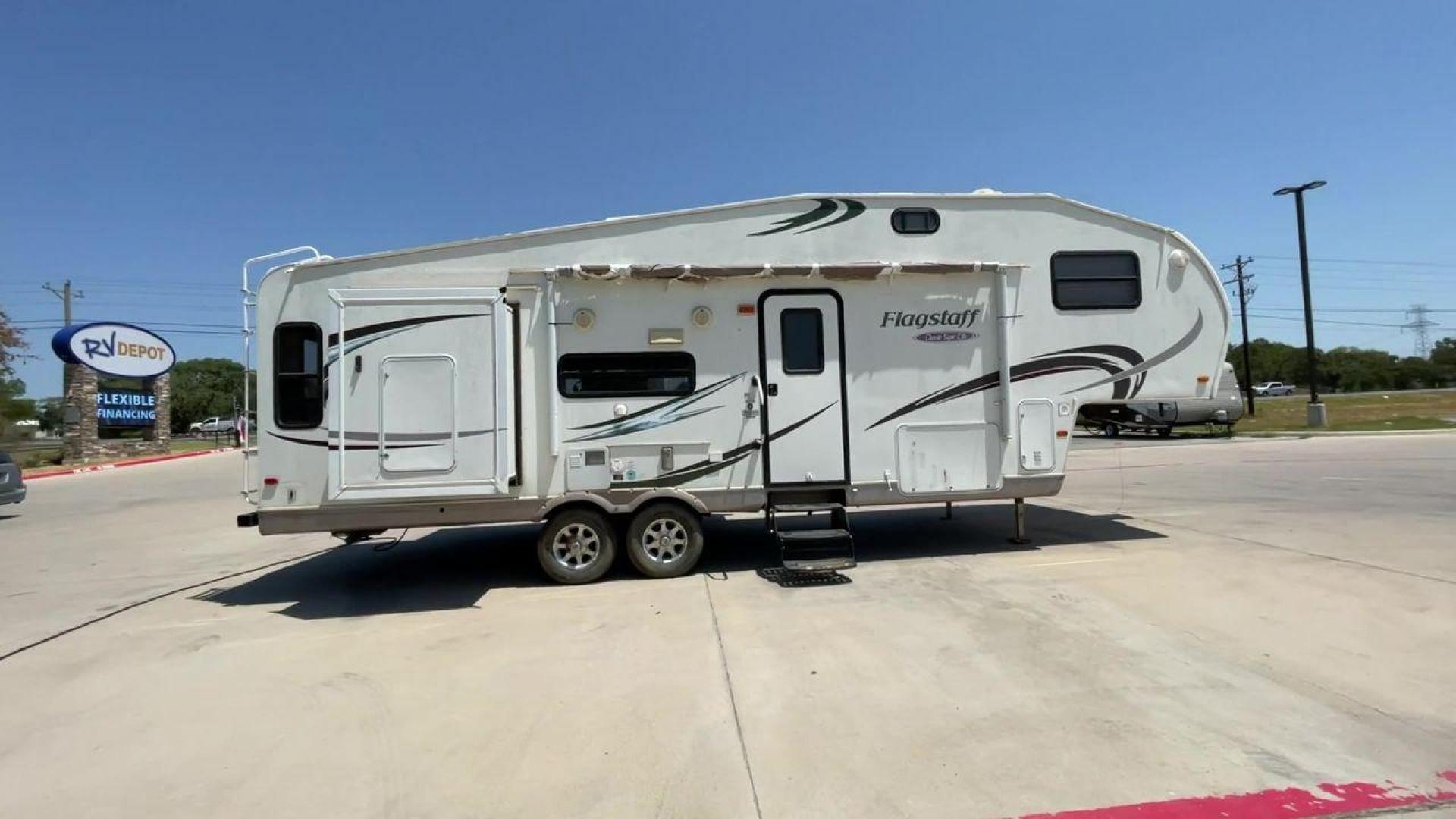 2010 WHITE FLAGSTAFF 8528CKSS - (4X4FFLD20A1) , Length: 30 ft. | Dry Weight: 6,877 lbs. | Slides: 2 transmission, located at 4319 N Main Street, Cleburne, TX, 76033, (817) 221-0660, 32.435829, -97.384178 - The 2010 Flagstaff 8528CKSS CT is a well-crafted and compact travel trailer designed for comfort and convenience on the road. With a length of 30 feet 11 inches, a width of 8 feet, and a height of 12 feet 7 inches, this trailer offers a balance of space and maneuverability. Its thoughtful constructi - Photo#2