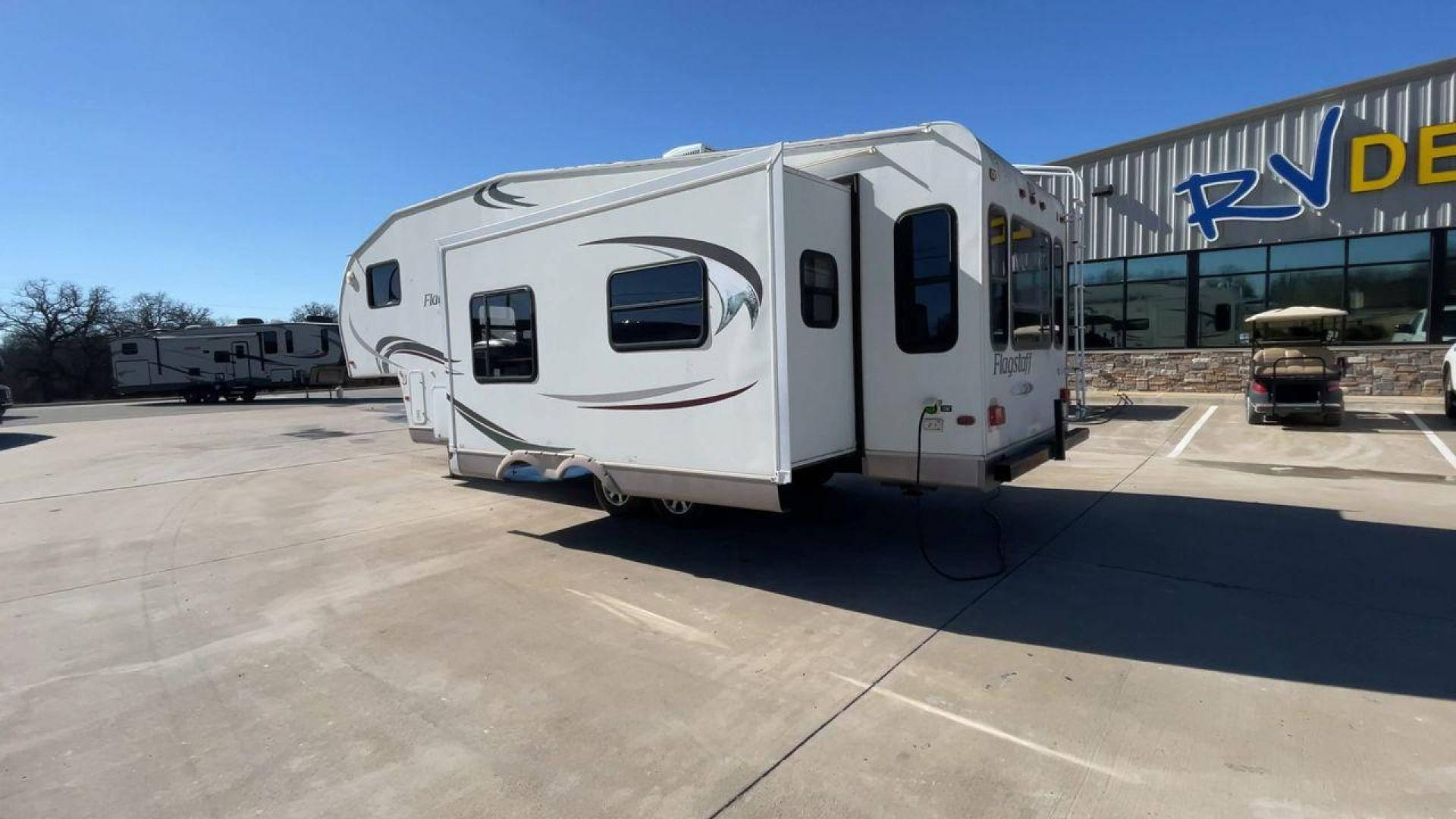 2010 WHITE FLAGSTAFF 8528CKSS - (4X4FFLD20A1) , Length: 30 ft. | Dry Weight: 6,877 lbs. | Slides: 2 transmission, located at 4319 N Main Street, Cleburne, TX, 76033, (817) 221-0660, 32.435829, -97.384178 - The 2010 Flagstaff 8528CKSS CT is a well-crafted and compact travel trailer designed for comfort and convenience on the road. With a length of 30 feet 11 inches, a width of 8 feet, and a height of 12 feet 7 inches, this trailer offers a balance of space and maneuverability. Its thoughtful constructi - Photo#7