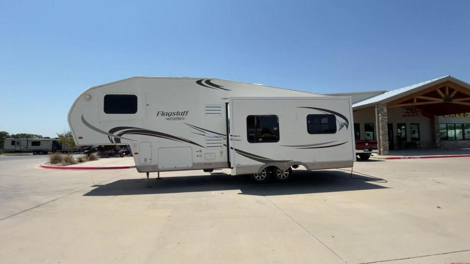 2010 WHITE FLAGSTAFF 8528CKSS - (4X4FFLD20A1) , Length: 30 ft. | Dry Weight: 6,877 lbs. | Slides: 2 transmission, located at 4319 N Main Street, Cleburne, TX, 76033, (817) 221-0660, 32.435829, -97.384178 - The 2010 Flagstaff 8528CKSS CT is a well-crafted and compact travel trailer designed for comfort and convenience on the road. With a length of 30 feet 11 inches, a width of 8 feet, and a height of 12 feet 7 inches, this trailer offers a balance of space and maneuverability. Its thoughtful constructi - Photo#6