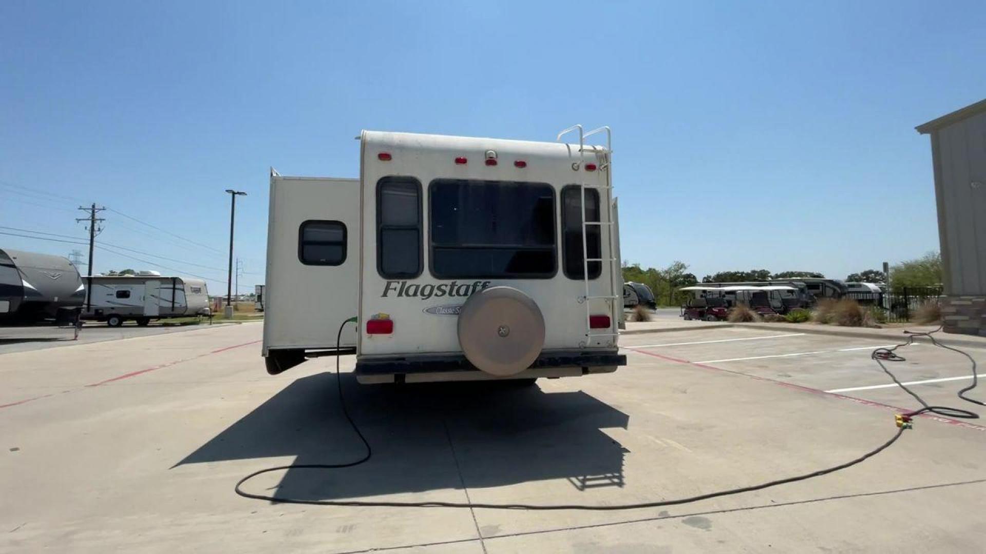 2010 WHITE FLAGSTAFF 8528CKSS - (4X4FFLD20A1) , Length: 30 ft. | Dry Weight: 6,877 lbs. | Slides: 2 transmission, located at 4319 N Main Street, Cleburne, TX, 76033, (817) 221-0660, 32.435829, -97.384178 - The 2010 Flagstaff 8528CKSS CT is a well-crafted and compact travel trailer designed for comfort and convenience on the road. With a length of 30 feet 11 inches, a width of 8 feet, and a height of 12 feet 7 inches, this trailer offers a balance of space and maneuverability. Its thoughtful constructi - Photo#8