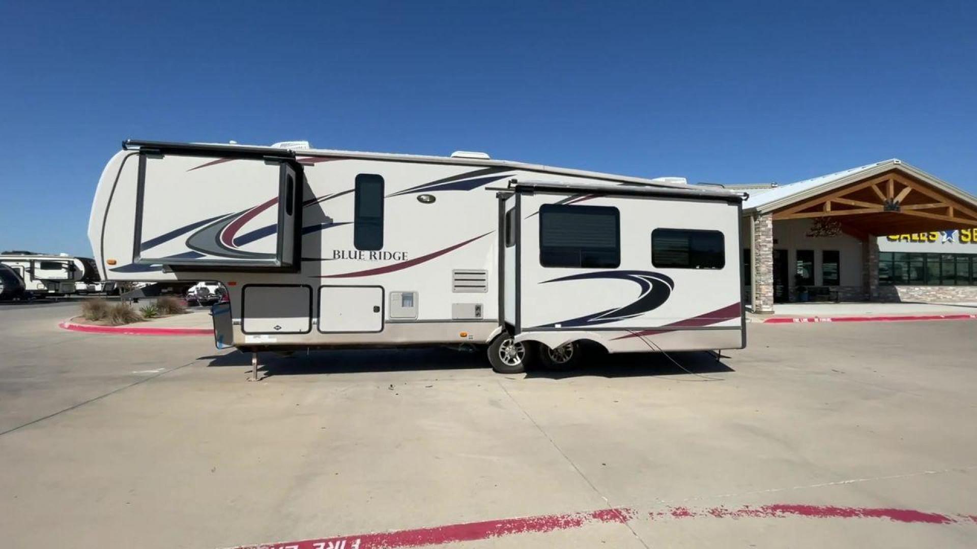 2011 TAN BLUE RIDGE 3125 (4X4FBLG22BG) , Length: 35.17 ft. | Dry Weight: 11,079 lbs. | Gross Weight: 13,975 lbs. | Slides: 3 transmission, located at 4319 N Main Street, Cleburne, TX, 76033, (817) 221-0660, 32.435829, -97.384178 - Discover the perfect blend of comfort and functionality with the 2011 Blue Ridge 3125. It is a meticulously designed fifth-wheel trailer crafted for unforgettable travel experiences. Extending to 35 feet, this model incorporates three slide-outs, ingeniously expanding the living space to create an i - Photo#1