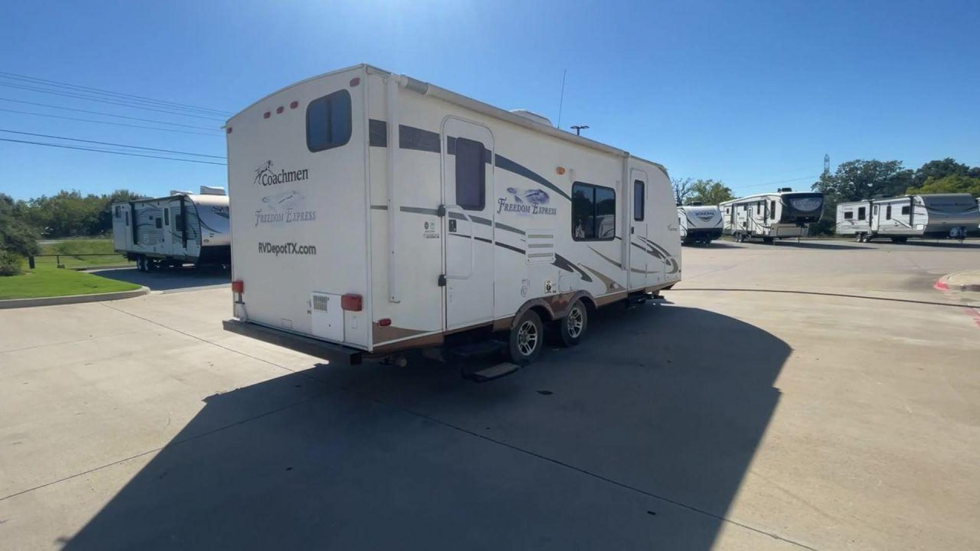 2011 COACHMEN FREEDOM EXPRESS 242R (5ZT2FENB9BA) , Length: 27.75 ft. | Dry Weight: 4,713 lbs. | Slides: 1 transmission, located at 4319 N Main Street, Cleburne, TX, 76033, (817) 221-0660, 32.435829, -97.384178 - The 2011 Forest River Freedom Express 242R is a lightweight travel trailer with a clever and practical floorplan! This camper measures over 27 ft. in length and weighs 4,713 lbs. unloaded. It is equipped with a large slide to maximize interior flooring. It also comes with two entries for peak conven - Photo#1