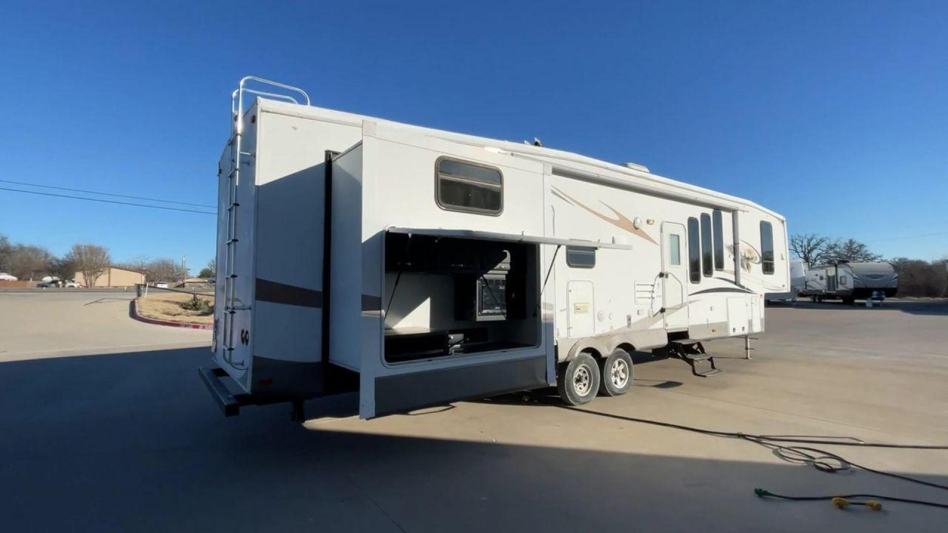 2011 WHITE FOREST RIVER SIERRA (4X4FSEN20BJ) , Length: 41.58 ft. | Dry Weight: 11,873 lbs. | Gross Weight: 14,060 lbs. | Slides: 4 transmission, located at 4319 N Main Street, Cleburne, TX, 76033, (817) 221-0660, 32.435829, -97.384178 - Enjoy your journeys as treasured chapters in your life, and turn every road into your family's playground in the 2011 Forest River Sierra 365SAQ. The measurements for this unit are 41.58 ft in length by 13 ft in height. It has a dry weight of 11,873 lbs with a GVWR of about 14,060 lbs and a hitch we - Photo#1