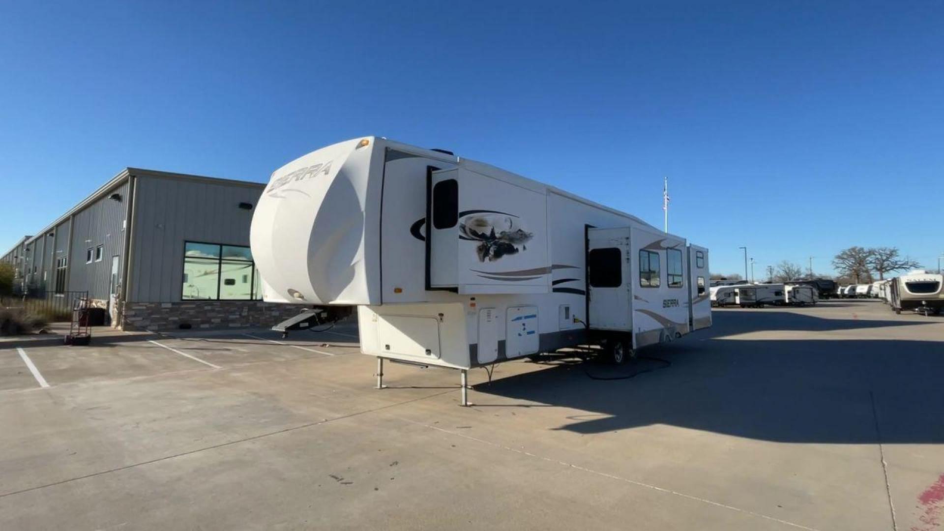 2011 WHITE FOREST RIVER SIERRA (4X4FSEN20BJ) , Length: 41.58 ft. | Dry Weight: 11,873 lbs. | Gross Weight: 14,060 lbs. | Slides: 4 transmission, located at 4319 N Main Street, Cleburne, TX, 76033, (817) 221-0660, 32.435829, -97.384178 - Enjoy your journeys as treasured chapters in your life, and turn every road into your family's playground in the 2011 Forest River Sierra 365SAQ. The measurements for this unit are 41.58 ft in length by 13 ft in height. It has a dry weight of 11,873 lbs with a GVWR of about 14,060 lbs and a hitch we - Photo#5