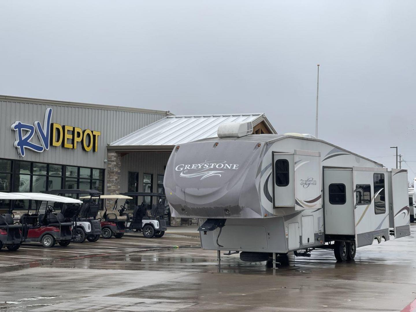 2011 GRAY GREYSTONE 33QB - (5SFSG3624BE) , Length: 36.8 ft. | Dry Weight: 11,466 lbs. | Gross Weight: 13,935 lbs. | Slides: 4 transmission, located at 4319 N Main Street, Cleburne, TX, 76033, (817) 221-0660, 32.435829, -97.384178 - Reasons to buy this RV include: (1) With four generous slide-outs, the interior space of this RV expands dramatically, providing ample room for relaxation and entertainment. (2) It features high-gloss fiberglass finish offers a sleek, modern aesthetic while providing a durable and low-maintenance - Photo#0