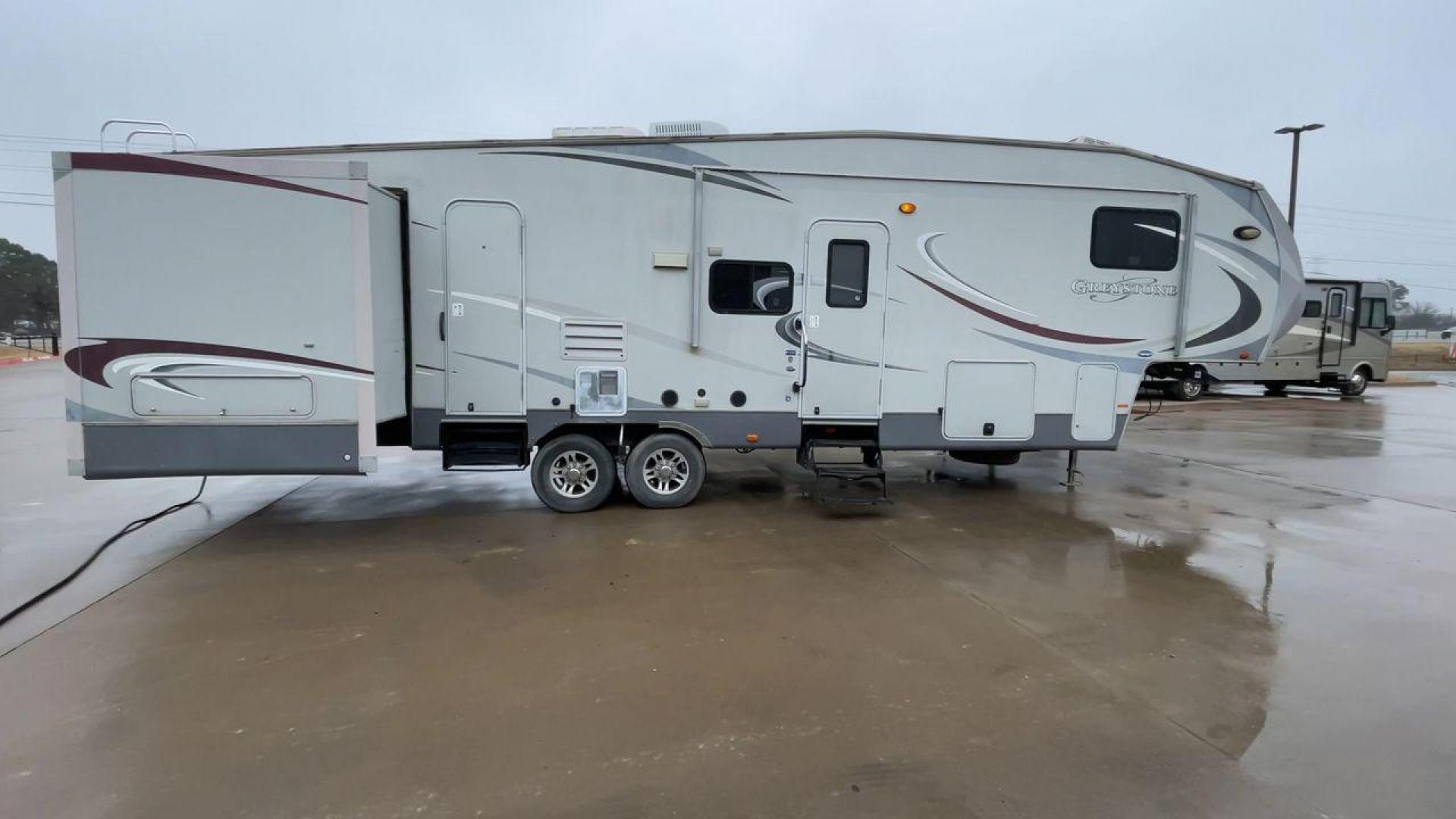 2011 GRAY GREYSTONE 33QB - (5SFSG3624BE) , Length: 36.8 ft. | Dry Weight: 11,466 lbs. | Gross Weight: 13,935 lbs. | Slides: 4 transmission, located at 4319 N Main Street, Cleburne, TX, 76033, (817) 221-0660, 32.435829, -97.384178 - Reasons to buy this RV include: (1) With four generous slide-outs, the interior space of this RV expands dramatically, providing ample room for relaxation and entertainment. (2) It features high-gloss fiberglass finish offers a sleek, modern aesthetic while providing a durable and low-maintenance - Photo#2