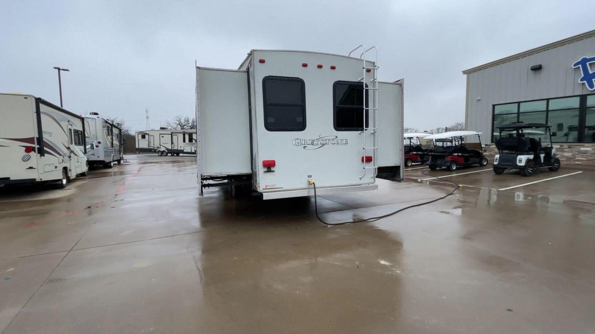 2011 GRAY GREYSTONE 33QB - (5SFSG3624BE) , Length: 36.8 ft. | Dry Weight: 11,466 lbs. | Gross Weight: 13,935 lbs. | Slides: 4 transmission, located at 4319 N Main Street, Cleburne, TX, 76033, (817) 221-0660, 32.435829, -97.384178 - Reasons to buy this RV include: (1) With four generous slide-outs, the interior space of this RV expands dramatically, providing ample room for relaxation and entertainment. (2) It features high-gloss fiberglass finish offers a sleek, modern aesthetic while providing a durable and low-maintenance - Photo#8