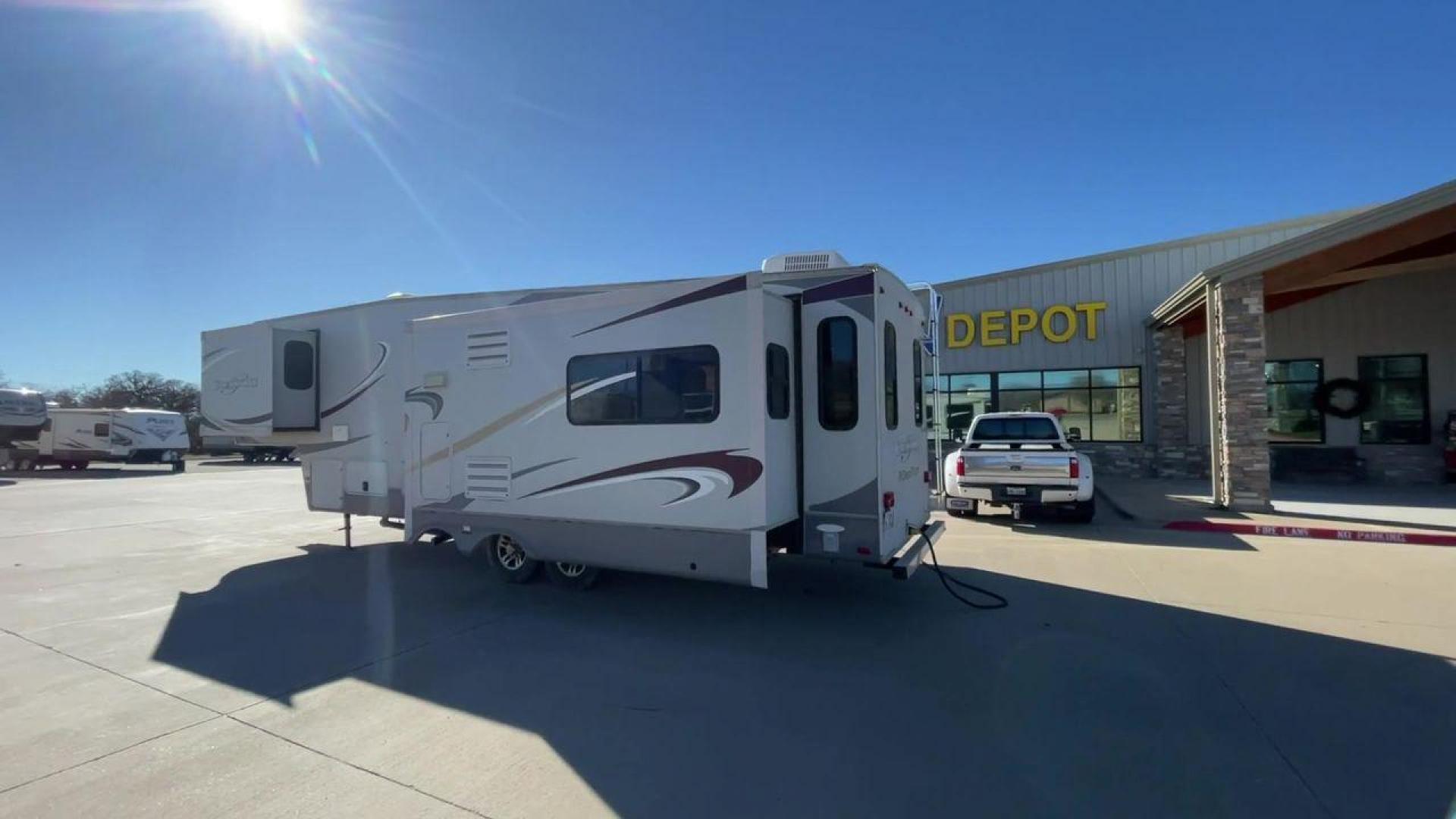 2011 WHITE HEARTLAND GREYSTONE 32RE (5SFSG3228BE) , Length: 34.83 ft. | Dry Weight: 10,421 lbs. | Gross Weight: 13,840 lbs. | Slides: 3 transmission, located at 4319 N Main Street, Cleburne, TX, 76033, (817) 221-0660, 32.435829, -97.384178 - This 2011 Heartland Greystone 32RE is a dual-axle aluminum wheel setup measuring nearly 35 feet long. It has a dry weight of 10,421 lbs. and a GVWR of 13,840 lbs. It includes three power slides as well as one 16-foot power awning. This unit features a classic rear living and front bedroom floor plan - Photo#7