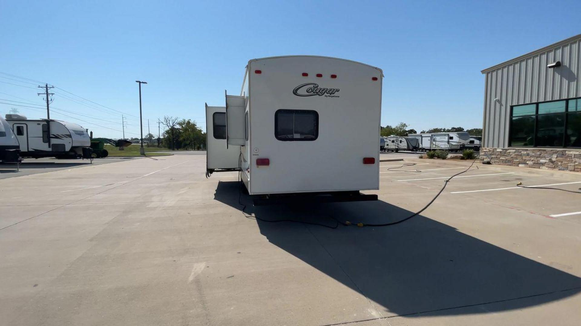 2011 KEYSTONE COUGAR 31SQB (4YDT31S20BV) , Length: 35.42 ft. | Dry Weight: 7,015 lbs. | Gross Weight: 9,000 lbs. | Slides: 2 transmission, located at 4319 N Main Street, Cleburne, TX, 76033, (817) 221-0660, 32.435829, -97.384178 - Photo#8