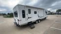 2011 KZ SPREE 323 RL (4EZTP3225B8) , located at 4319 N Main Street, Cleburne, TX, 76033, (817) 221-0660, 32.435829, -97.384178 - The 2011 KZSP CT features a clean and functional exterior design with practicality at its core. The white exterior is complemented by simple black graphic accents that stretch along the sides, providing a subtle yet stylish contrast. At the rear, the trailer includes a window for added natural light - Photo#1