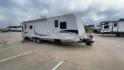 2011 KZ SPREE 323 RL (4EZTP3225B8) , located at 4319 N Main Street, Cleburne, TX, 76033, (817) 221-0660, 32.435829, -97.384178 - The 2011 KZSP CT features a clean and functional exterior design with practicality at its core. The white exterior is complemented by simple black graphic accents that stretch along the sides, providing a subtle yet stylish contrast. At the rear, the trailer includes a window for added natural light - Photo#3