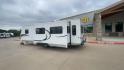 2011 KZ SPREE 323 RL (4EZTP3225B8) , located at 4319 N Main Street, Cleburne, TX, 76033, (817) 221-0660, 32.435829, -97.384178 - The 2011 KZSP CT features a clean and functional exterior design with practicality at its core. The white exterior is complemented by simple black graphic accents that stretch along the sides, providing a subtle yet stylish contrast. At the rear, the trailer includes a window for added natural light - Photo#7