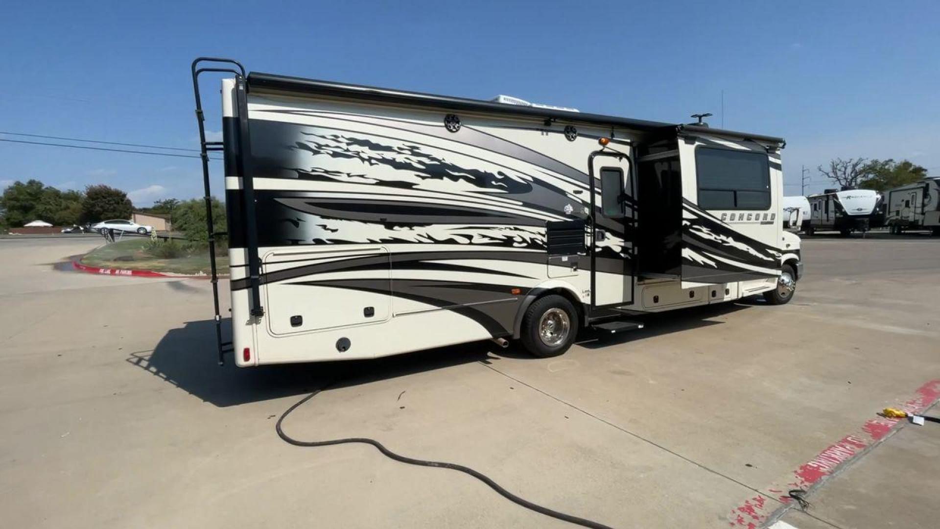 2012 WHITE COACHMEN CONCORD 300TS (1FDXE4FS9BD) , Length: 30.83 ft. | Dry Weight: 12,110 lbs. | Gross Weight: 14,500 lbs. | Slides: 3 transmission, located at 4319 N Main Street, Cleburne, TX, 76033, (817) 221-0660, 32.435829, -97.384178 - Photo#1