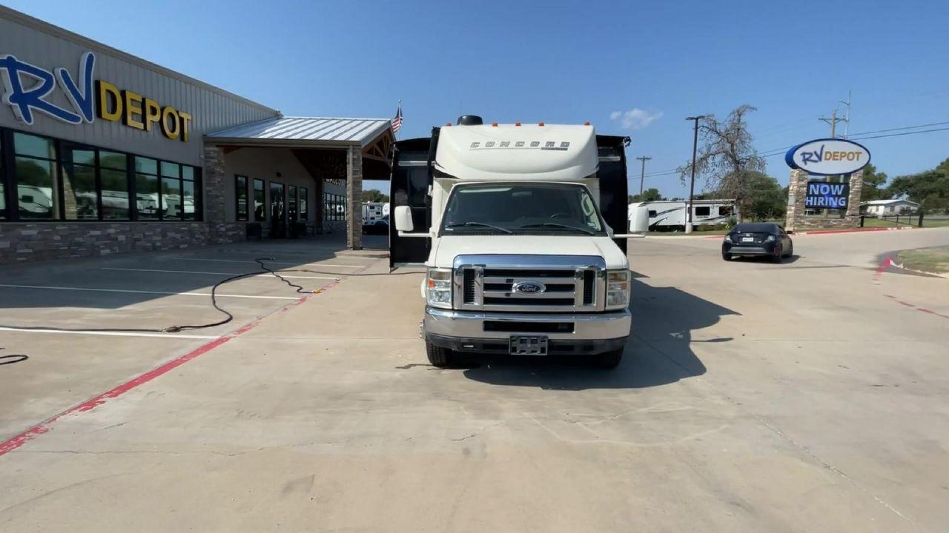 2012 WHITE COACHMEN CONCORD 300TS (1FDXE4FS9BD) , Length: 30.83 ft. | Dry Weight: 12,110 lbs. | Gross Weight: 14,500 lbs. | Slides: 3 transmission, located at 4319 N Main Street, Cleburne, TX, 76033, (817) 221-0660, 32.435829, -97.384178 - Photo#4