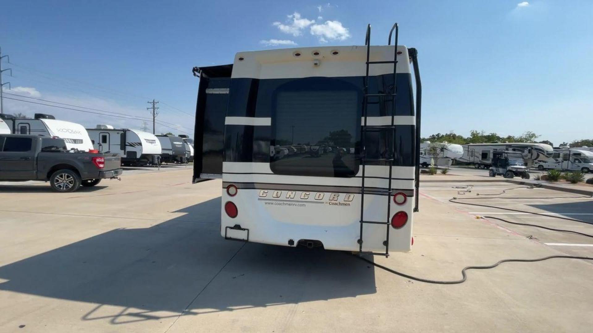 2012 WHITE COACHMEN CONCORD 300TS (1FDXE4FS9BD) , Length: 30.83 ft. | Dry Weight: 12,110 lbs. | Gross Weight: 14,500 lbs. | Slides: 3 transmission, located at 4319 N Main Street, Cleburne, TX, 76033, (817) 221-0660, 32.435829, -97.384178 - Photo#8