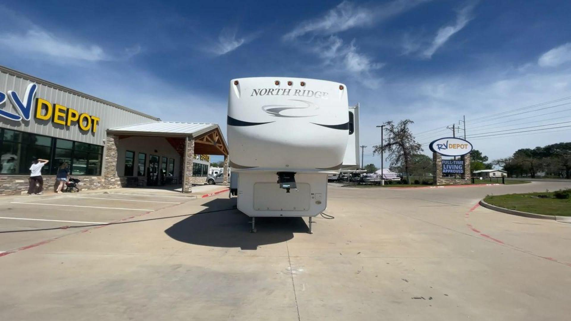 2012 COACHMEN NORTH RIDGE 320RLQ (5ZT3NRXB6CA) , Length: 37.17 ft. | Dry Weight: 10,405 lbs. | Gross Weight: 15,000 lbs. | Slides: 4 transmission, located at 4319 N Main Street, Cleburne, TX, 76033, (817) 221-0660, 32.435829, -97.384178 - The 2012 Coachmen North Ridge 320RLQ is a 37-foot fifth wheel with four slides and an aluminum frame. With the quadruple slides, space and storage will never be an issue! The unit also comes with automatic heating and cooling rated at 40,000 and 15,000 BTUs, respectively. The interior has beautiful - Photo#4