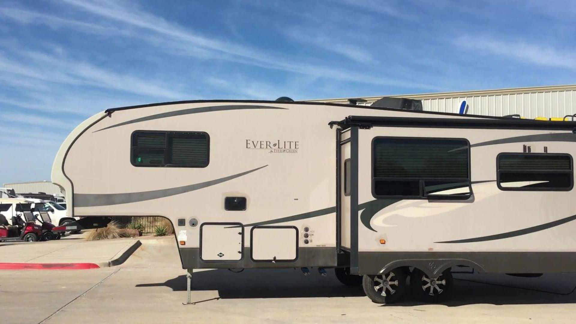 2012 BROWN EVERLITE EVERGREEN 30RLS-5 - (5ZWFE3120C1) , Length: 30.92 ft. | Dry Weight: 7,570 lbs. | Gross Weight: 9,895 lbs. | Slides: 1 transmission, located at 4319 N Main Street, Cleburne, TX, 76033, (817) 221-0660, 32.435829, -97.384178 - Discover the perfect blend of comfort and innovation with the 2012 EverLite EverGreen 30RLS-5 Fifth Wheel. Crafted with an emphasis on lightweight design and eco-friendly materials, this fifth wheel offers a spacious and eco-conscious home on wheels for your travels. This unit measures 30.92 ft i - Photo#1