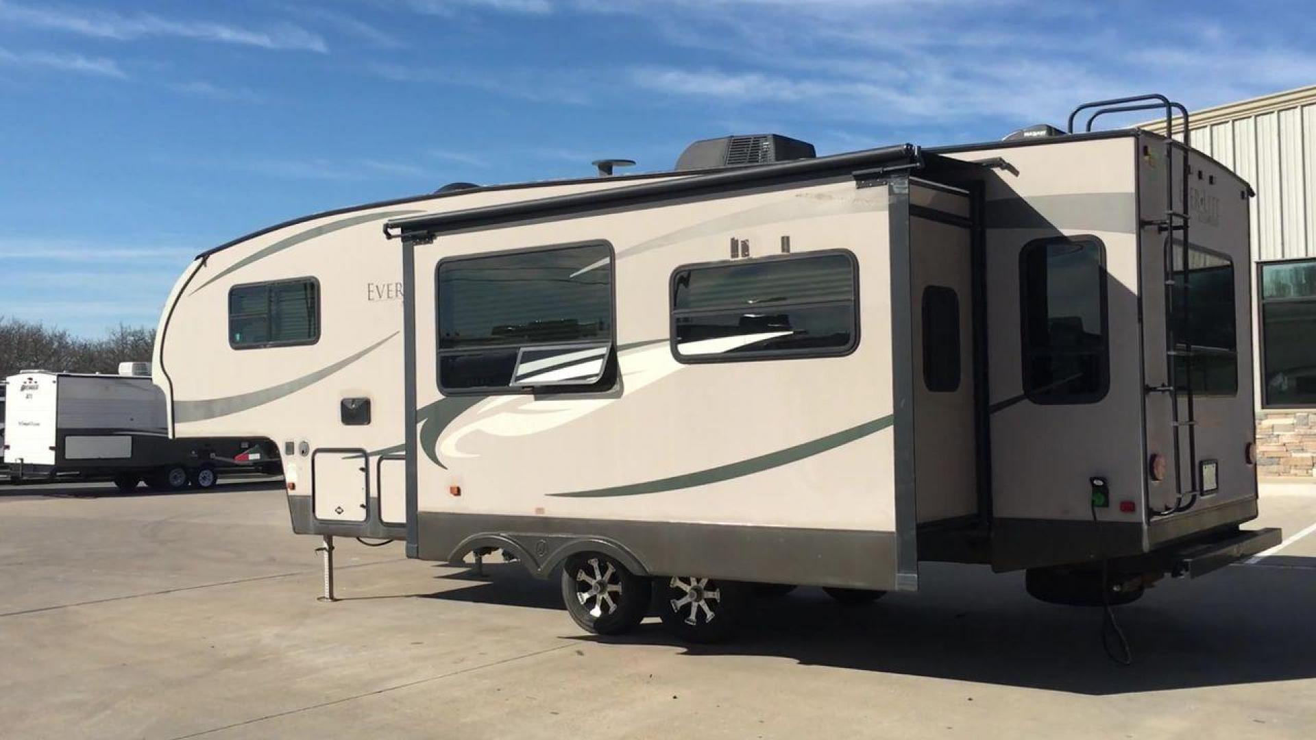 2012 BROWN EVERLITE EVERGREEN 30RLS-5 - (5ZWFE3120C1) , Length: 30.92 ft. | Dry Weight: 7,570 lbs. | Gross Weight: 9,895 lbs. | Slides: 1 transmission, located at 4319 N Main Street, Cleburne, TX, 76033, (817) 221-0660, 32.435829, -97.384178 - Discover the perfect blend of comfort and innovation with the 2012 EverLite EverGreen 30RLS-5 Fifth Wheel. Crafted with an emphasis on lightweight design and eco-friendly materials, this fifth wheel offers a spacious and eco-conscious home on wheels for your travels. This unit measures 30.92 ft i - Photo#2