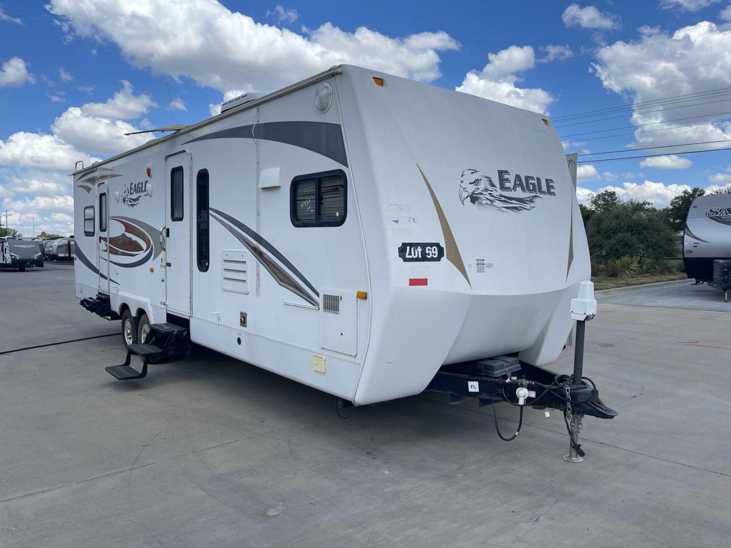 2012 WHITE JAYCO EAGLE 322FKS (1UJBJ0BR3C1) , Length: 33.92 ft. | Dry Weight: 7,835 lbs. | Gross Weight: 10,250 lbs. | Slides: 2 transmission, located at 4319 N Main Street, Cleburne, TX, 76033, (817) 221-0660, 32.435829, -97.384178 - The 2012 Jayco Eagle 322FKS is a dual-axle aluminum wheel set-up that measures 33.92 ft. in length. It has a dry weight of 7,835 lbs. and a GVWR of 10,250 lbs. Its exterior is a base color of white with gray, black and gold accents. This trailer has 2 slides. This Jayco has a rear bedroom, front - Photo#23