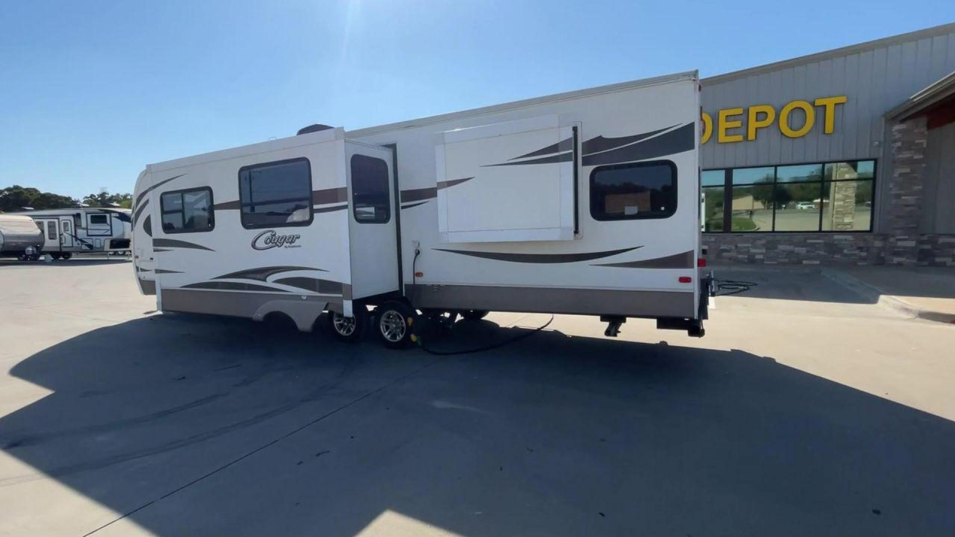 2012 KEYSTONE COUGAR 31SQB (4YDT31S28CW) , Length: 35.92 ft. | Dry Weight: 7,169 lbs. | Gross Weight: 9,000 lbs. | Slides: 2 transmission, located at 4319 N Main Street, Cleburne, TX, 76033, (817) 221-0660, 32.435829, -97.384178 - Experience the perfect blend of comfort, style, and functionality with the 2012 Keystone Cougar 31SQB. With a length of 35.92 ft., this RV is designed to provide your family with a home away from home. This unit ensures that you and your family have plenty of room to relax and enjoy your travels. Th - Photo#7