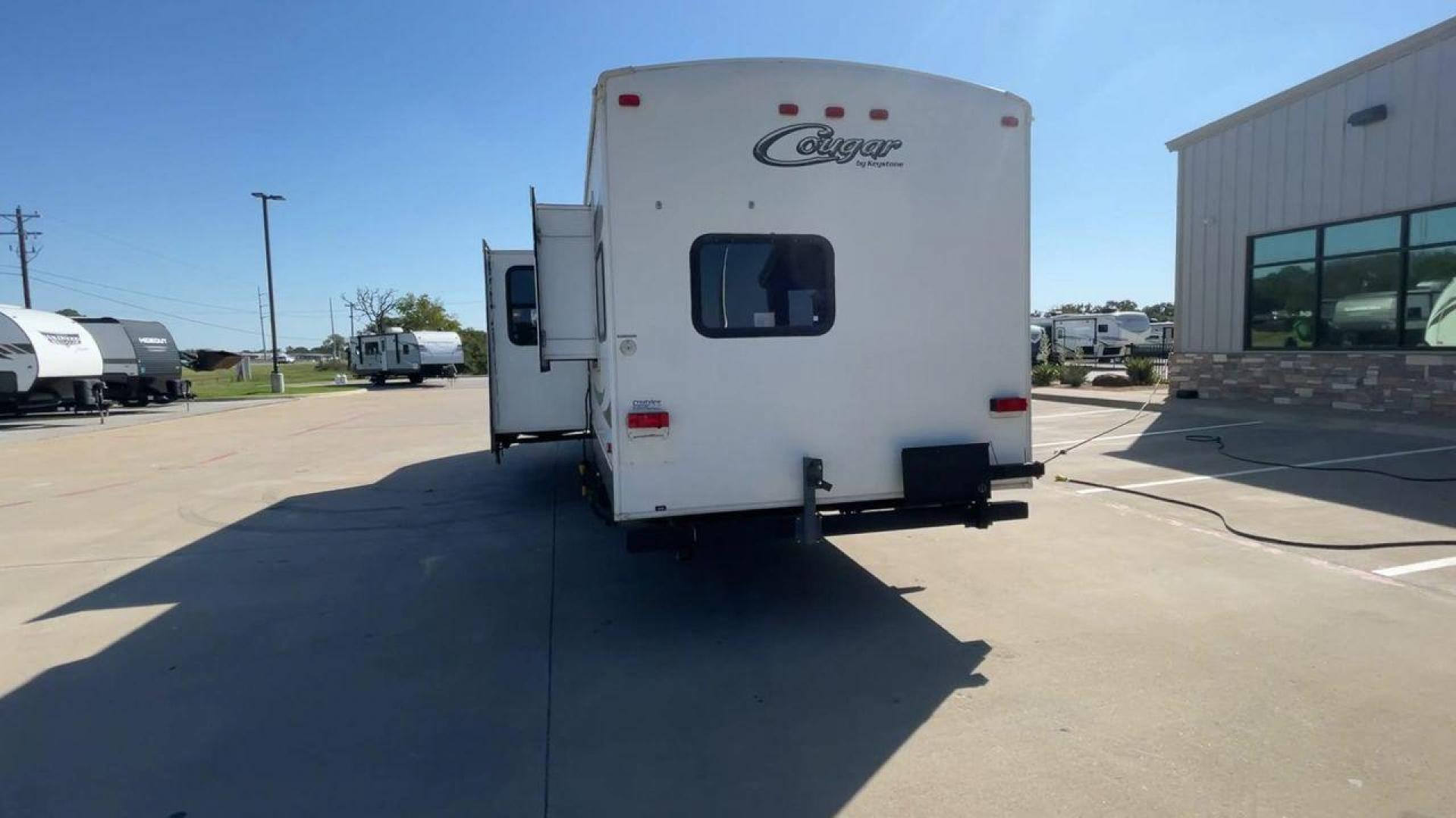 2012 KEYSTONE COUGAR 31SQB (4YDT31S28CW) , Length: 35.92 ft. | Dry Weight: 7,169 lbs. | Gross Weight: 9,000 lbs. | Slides: 2 transmission, located at 4319 N Main Street, Cleburne, TX, 76033, (817) 221-0660, 32.435829, -97.384178 - Experience the perfect blend of comfort, style, and functionality with the 2012 Keystone Cougar 31SQB. With a length of 35.92 ft., this RV is designed to provide your family with a home away from home. This unit ensures that you and your family have plenty of room to relax and enjoy your travels. Th - Photo#8