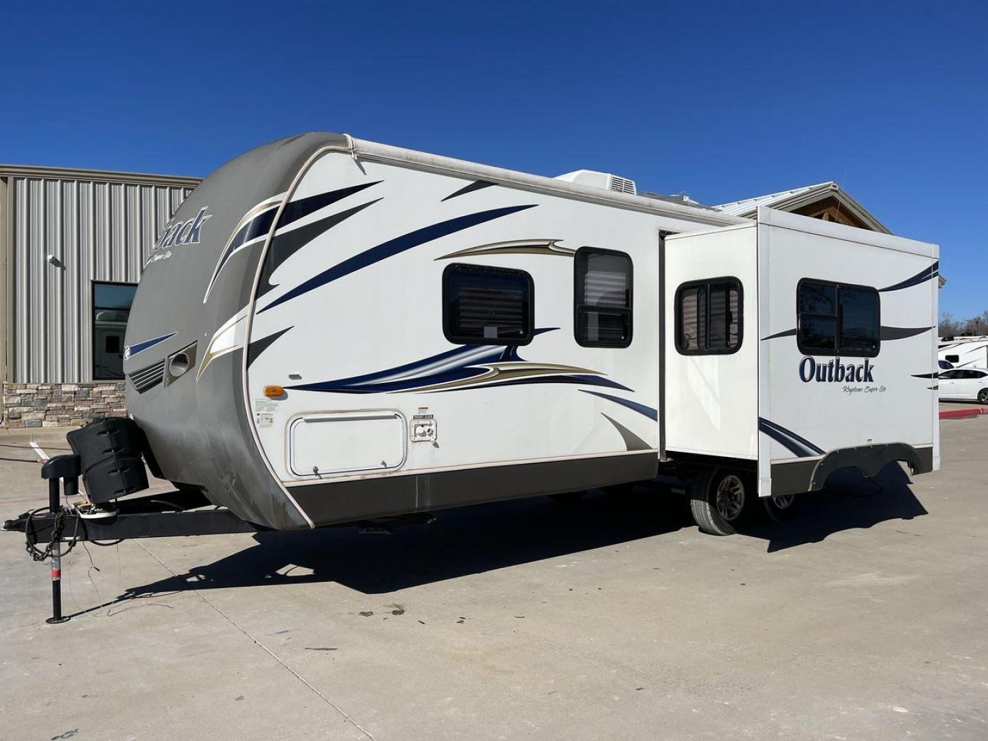 2012 KEYSTONE RV OUTBACK 274RB (4YDT27420CB) , Length: 30.33 ft | Dry Weight: 5,995 lbs. | Gross Weight: 7,800 lbs. | Slides: 1 transmission, located at 4319 N Main Street, Cleburne, TX, 76033, (817) 221-0660, 32.435829, -97.384178 - Experience the 2012 Keystone RV Outback 274RB Travel Trailer, the ideal fusion of adventure and comfort. This well-built travel trailer is a great option for any family or couple looking for a roomy and fashionable mobile home. The dimensions of this unit are 30.33 ft in length, 8 ft in width, an - Photo#22