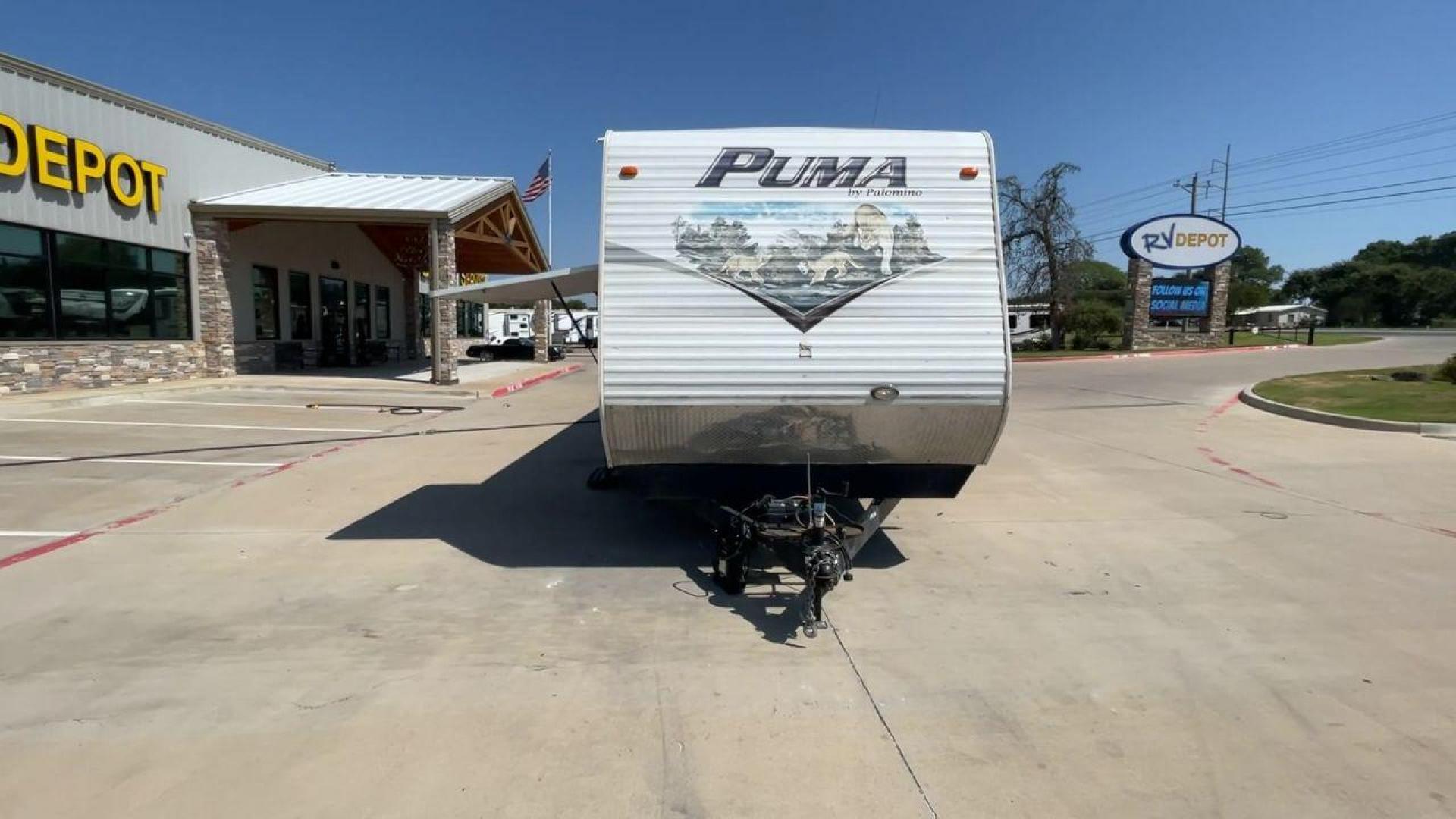 2012 WHITE PUMA 30KFB (4X4TPUF27CP) , Length: 34.75 ft. | Dry Weight: 8,130 lbs. | Gross Weight: 11,315 lbs. | Slides: 2 transmission, located at 4319 N Main Street, Cleburne, TX, 76033, (817) 221-0660, 32.435829, -97.384178 - The 2012 Puma 30KFB travel trailer has 34.75 ft length, 8 ft width, 11.08 ft height, and 6.67 ft interior height. The dry weight of this unit is about 8,130 lbs, with a payload capacity of 3,125 lbs. It has a GVWR of 11,315 lbs and a hitch weight of 1,155 lbs. This unit highlights an outdoor fro - Photo#4