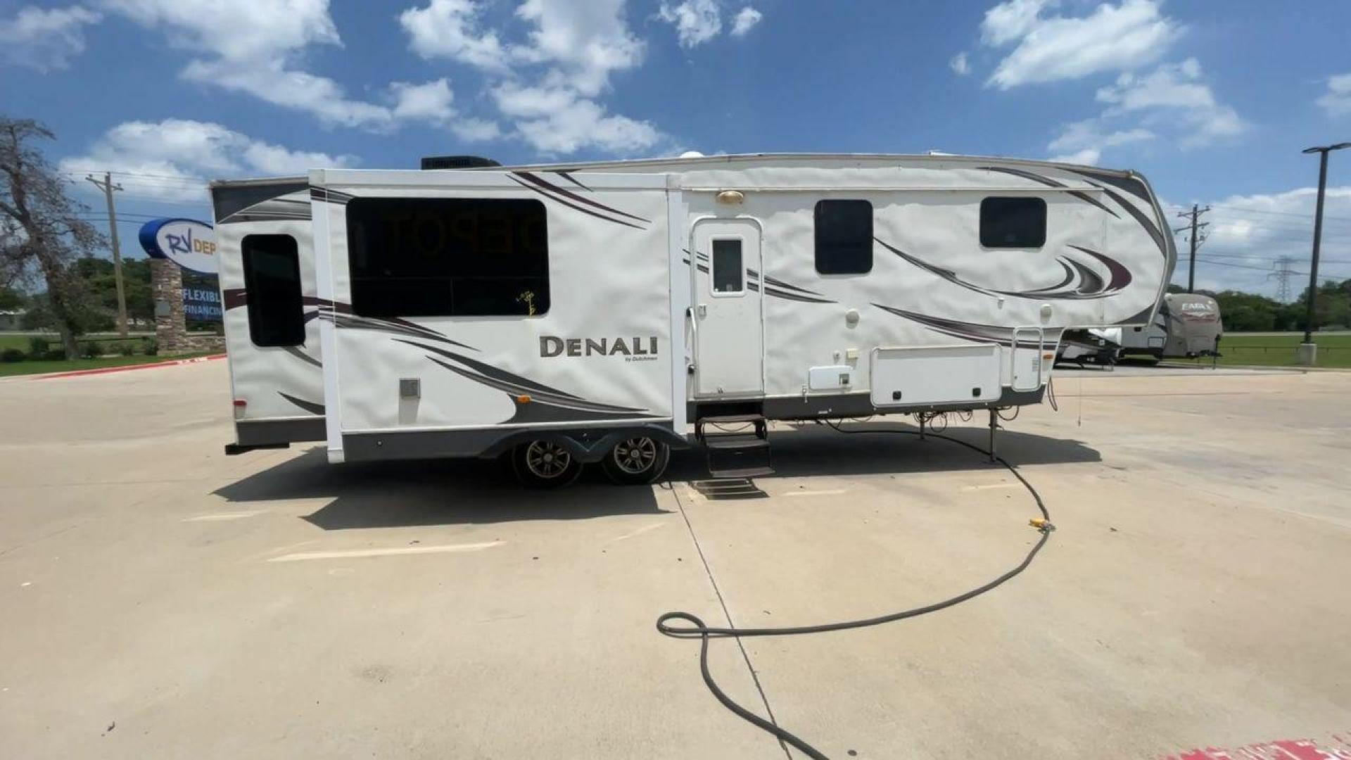 2013 WHITE DENALI 319RLS (47CFD1S24DP) , Length: 35.5 ft. | Dry Weight: 9,326 lbs. | Slides: 3 transmission, located at 4319 N Main Street, Cleburne, TX, 76033, (817) 221-0660, 32.435829, -97.384178 - Looking for a nice-sized family fifth wheel suitable for residential living? Check out this 2013 Dutchmen Denali 319RLS! This fifth wheel measures 35.5 feet long and 12.08 feet tall. It has a dry weight of 9,326 lbs. and a payload capacity of 2,866 lbs. It includes three power slides as well as o - Photo#2