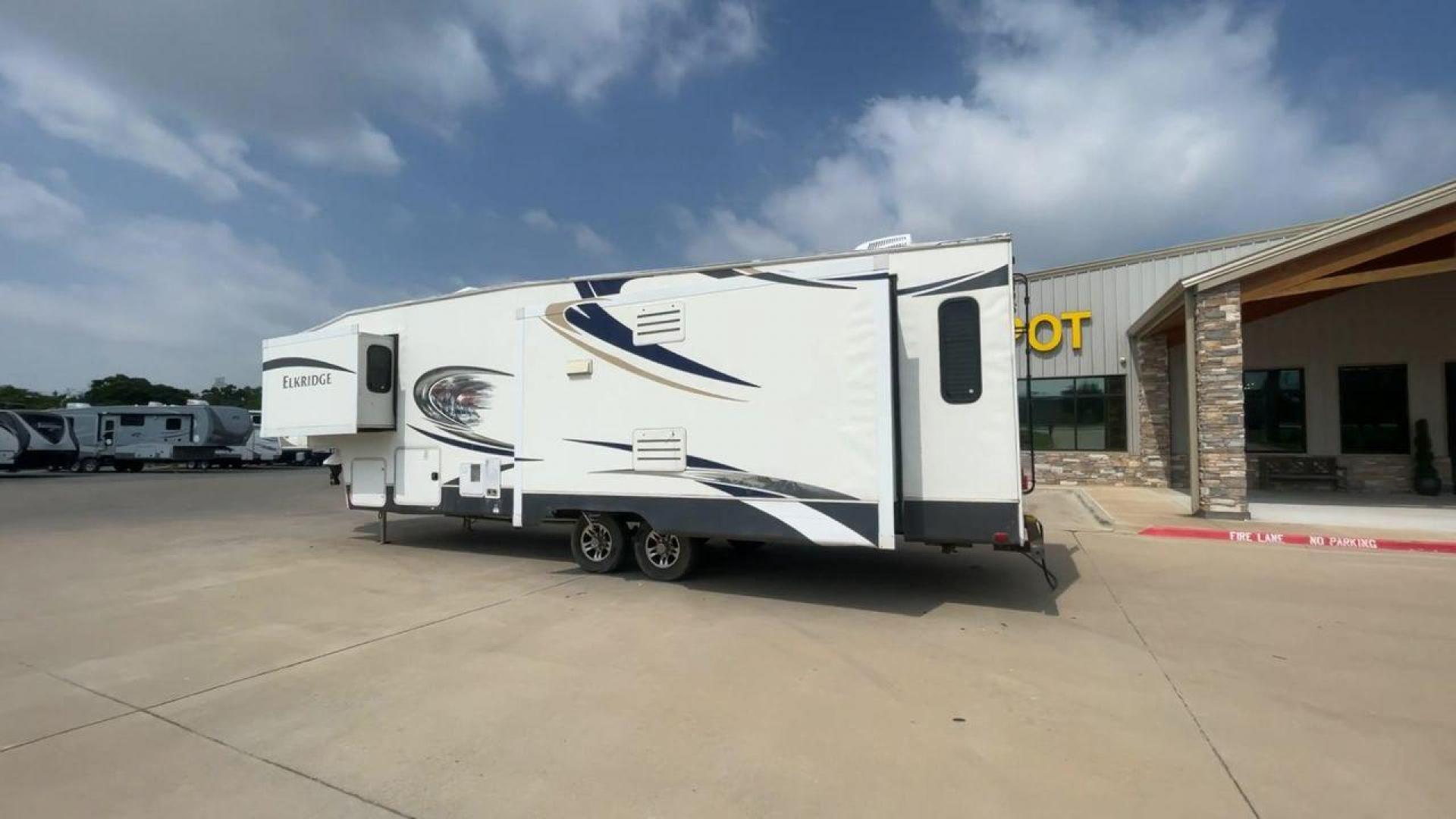 2013 ELKRIDGE 32TSRE - (5SFRG3623DE) , Length: 36.92 ft. | Dry Weight: 10,502 lbs. | Gross Weight: 14,405 lbs. | Slides: 3 transmission, located at 4319 N Main Street, Cleburne, TX, 76033, (817) 221-0660, 32.435829, -97.384178 - The 2013 Elkridge 32TSRE fifth wheel has dimensions of 36.92 ft length, 8 ft width, and 12.92 ft height. It has a dry weight of about 10,502 lbs with a payload capacity of 3,903 lbs. The GVWR of this unit is 14,405 lbs and has a hitch weight of 2,075 lbs. It comes with three power slideouts and one - Photo#7