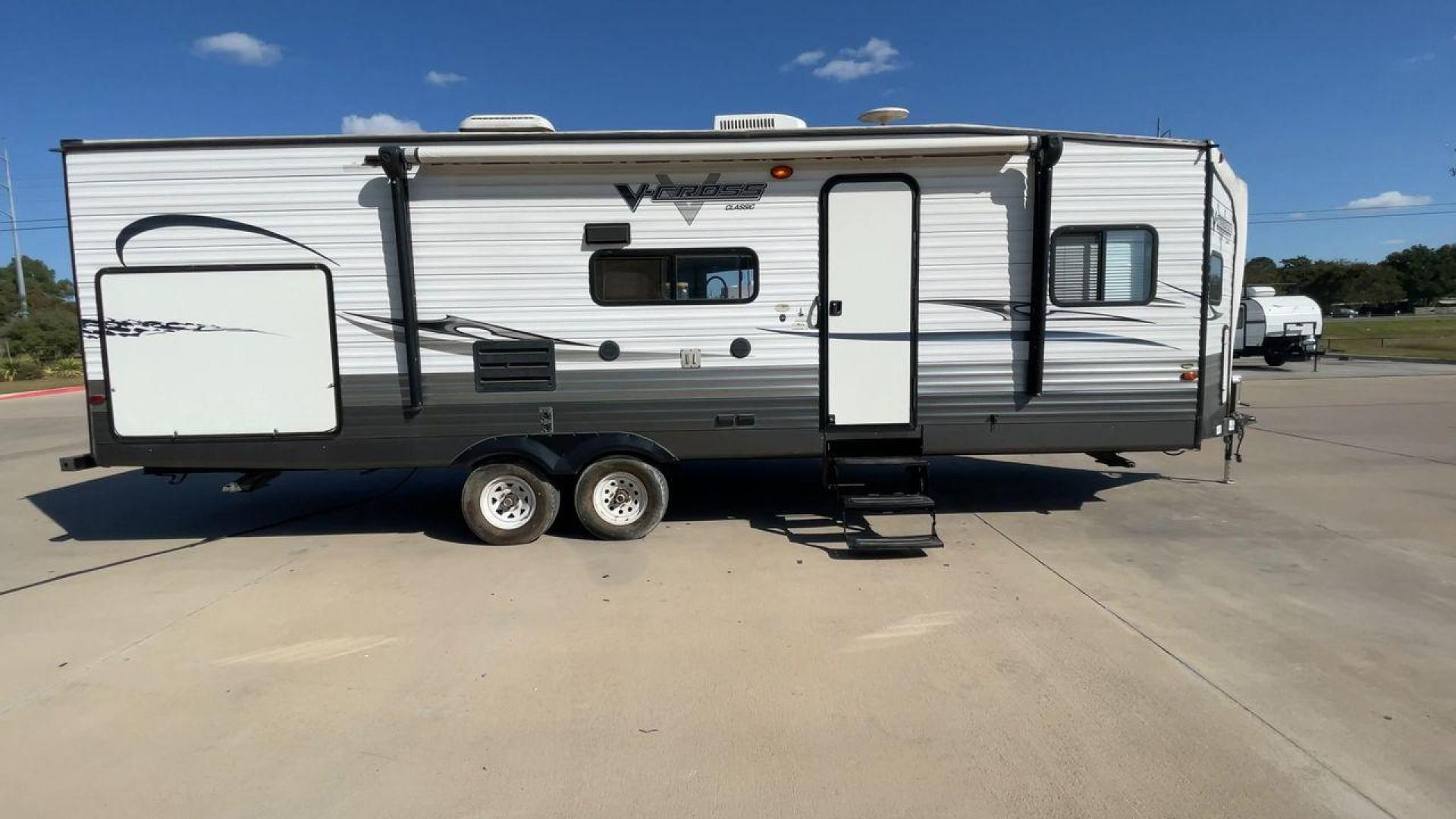 2013 WHITE FOREST RIVER VCROSS 28VRBK (4X4TVCD28DX) , Length: 32.17 ft. | Dry Weight: 7,538 lbs. | Gross Weight: 9,985 lbs. | Slides: 1 transmission, located at 4319 N Main Street, Cleburne, TX, 76033, (817) 221-0660, 32.435829, -97.384178 - The 2013 Forest River V-Cross 28VRBK is a dual-axle steel wheel set-up that measures just a little over 32 ft. in length. It has a dry weight of 7,538 lbs. and a GVWR of 9,985 lbs. It is equipped with 1 power slide. It also comes with automatic heating and cooling rated at 30,000 and 13,500 BTUs res - Photo#2