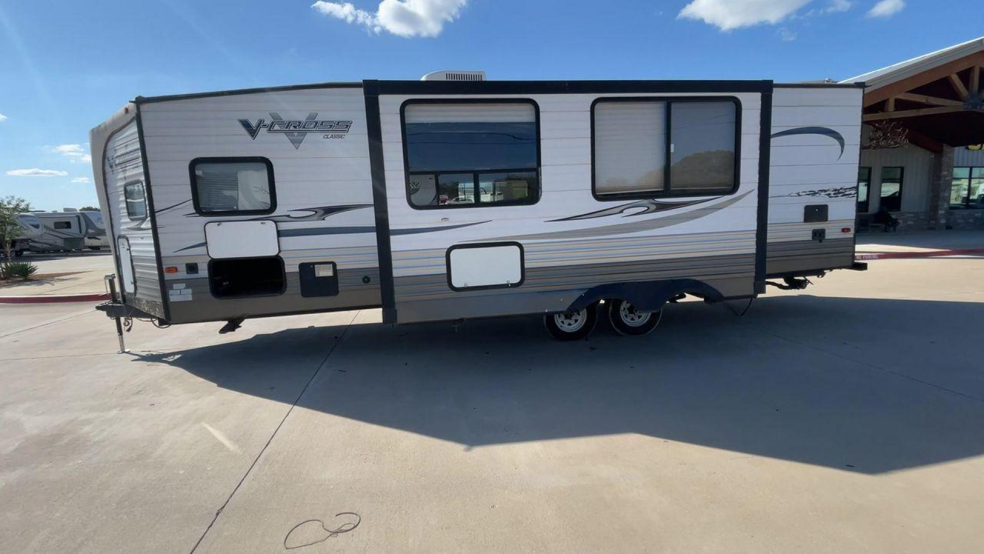 2013 WHITE FOREST RIVER VCROSS 28VRBK (4X4TVCD28DX) , Length: 32.17 ft. | Dry Weight: 7,538 lbs. | Gross Weight: 9,985 lbs. | Slides: 1 transmission, located at 4319 N Main Street, Cleburne, TX, 76033, (817) 221-0660, 32.435829, -97.384178 - The 2013 Forest River V-Cross 28VRBK is a dual-axle steel wheel set-up that measures just a little over 32 ft. in length. It has a dry weight of 7,538 lbs. and a GVWR of 9,985 lbs. It is equipped with 1 power slide. It also comes with automatic heating and cooling rated at 30,000 and 13,500 BTUs res - Photo#6